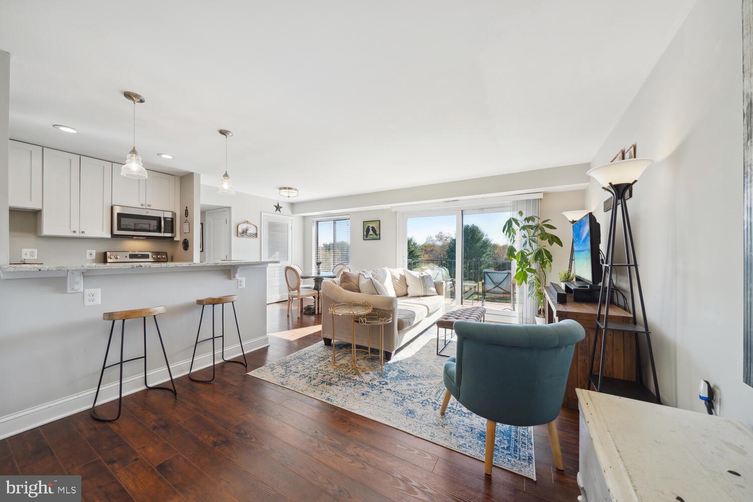 Discover the epitome of comfortable living in this beautifully remodeled two-bedroom, two-bathroom residence, boasting nearly 1,000 square feet of open-plan living space. Fully renovated in 2018, this home features a modern kitchen and bathrooms, complemented by a convenient, rarely available, in-unit washer and dryer - no community laundry for this one! The updates also include a newer sliding glass door (upgraded in 2020) leading to your private balcony, offering a premium view of what once was a lush golf course, now a serene conservation space.  This unit also includes a separate storage unit in the lower level of the building.
<br><br>
This inviting home is part of a vibrant community, enriched with amenities such as a swimming pool, a picnic area, abundant green spaces, and open parking. Situated just two miles from the Ida Lee Park Recreation Center, residents have easy access to a state-of-the-art fitness center, indoor pools, and more. For those seeking leisure and entertainment, this home is less than a mile from various dining, shopping, and recreation options, including the Leesburg Premium Outlets, Costco, and the charm of Loudoun County's renowned wineries. 
<br><br>
Enjoy unparalleled convenience with easy access to major routes such as Rt. 7, 15, and 267. The proximity to the Silver Line Metro and Dulles Airport ensures connectivity to wherever life takes you. Make this your oasis, a perfect blend of tranquility and accessibility.