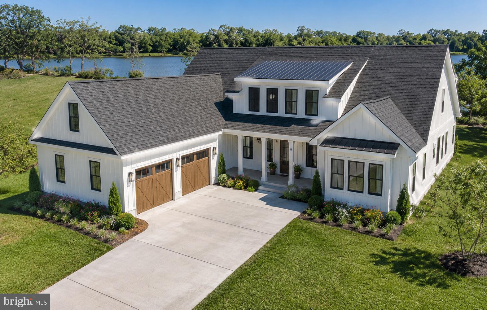 Welcome to your future dream home in the highly sought-after Olde Town community in Lewes, Delaware. This to-be-built custom residence by Excel Construction Group blends coastal living with modern luxury, offering 4 spacious bedrooms, 3.5 designer bathrooms, and 3,000 square feet of thoughtfully designed living space.

The open-concept floor plan creates a seamless flow between the gourmet kitchen, inviting living area, and sun-drenched dining space—perfect for entertaining or relaxing at home. A luxurious primary suite features a spa-inspired en-suite bath and expansive walk-in closet, while the additional bedrooms provide flexible options for guests, a home office, or a growing family.

Outdoor living is elevated with a welcoming front porch and a versatile all-season rear porch, ideal for year-round enjoyment and hosting. The oversized garage and designer finishes throughout make this home as functional as it is beautiful.

Located just minutes from historic downtown Lewes, pristine beaches, and local dining, this home offers the perfect combination of coastal lifestyle and upscale comfort.

Customize your finishes and bring your vision to life! Photos are of a similar home built by the builder.