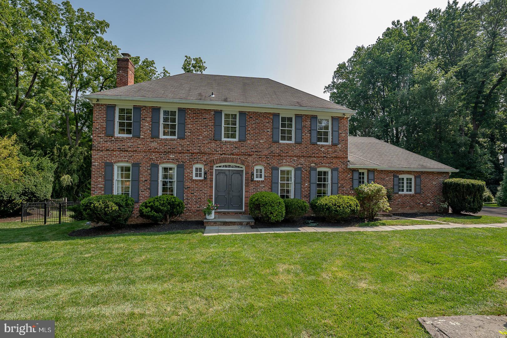 Welcome to this timeless 5-bedroom Colonial gem, nestled on a sought-after private cul-de-sac in the quiet northside of Bryn Mawr. With classic charm and modern upgrades, this residence offers a harmonious blend of elegance and comfort.

As you enter, the rich hardwood floors lead you through a series of beautifully appointed rooms.  The spacious Living Room, with its classic details, and the Formal Dining Room, perfect for hosting gatherings and special occasions flank the beautiful center foyer.  The Fireside Family Room, conveniently located adjacent to the well-designed kitchen, offers a cozy retreat for relaxing and family time.

Sunlight pours into the inviting Solarium, providing a serene space for morning coffee, reading or a home office. Step outside to the deck and patio, ideal for outdoor entertaining and enjoying the beautiful grounds.

The second floor is dedicated to restful retreats, featuring a generously-sized Primary Bedroom with ample closets and a luxurious ensuite bathroom. Three additional well-proportioned bedrooms share a full hall bath. A unique third-floor suite includes a fifth bedroom with its own ensuite bathroom, offering privacy and versatility.  Attic storage. 

The full basement, accessible from an outside entrance, presents an excellent opportunity for customization, whether you envision a recreational space, home gym, or additional storage.

Additional highlights include a two-car attached garage with new doors, a resurfaced driveway, and a new roof and gutters. This home has been pre-inspected, providing peace of mind for the next fortunate owners.

Cherished by its original owners, this residence is ready for you to create lasting memories. Embrace the opportunity to call this elegant Colonial home and experience all the convenience and charm  that Bryn Mawr has to offer.
**Please do not drive on the driveway. It has just been resurfaced and needs time to cure.