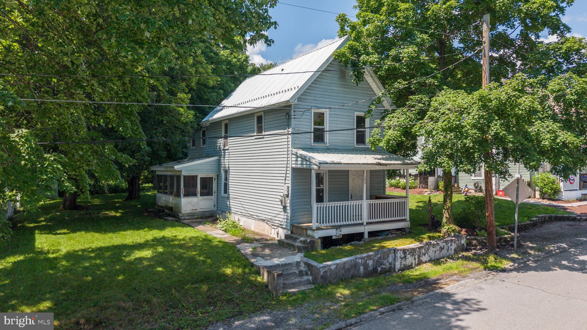 Opportunity awaits at 109 Cole Street in Bellefonte! Situated on a double lot, this home is ready for its next chapter. Whether you're an investor, renovator, or buyer looking to build equity, this fixer-upper offers endless possibilities.

Inside, you'll find hardwood floors just waiting to be restored.  The eat-in kitchen offers room for everyday dining, with a screened-in porch that provides the perfect place to relax and enjoy the outdoors and the generously sized living area provides a comfortable gathering space.  Upstairs features two bedrooms a flex space and a full bathroom, plus a walk-up attic offering excellent storage or the possibility for future finished space. 

Exterior includes durable vinyl siding, vinyl windows, and a metal roof, giving you a solid starting point for your renovation vision.