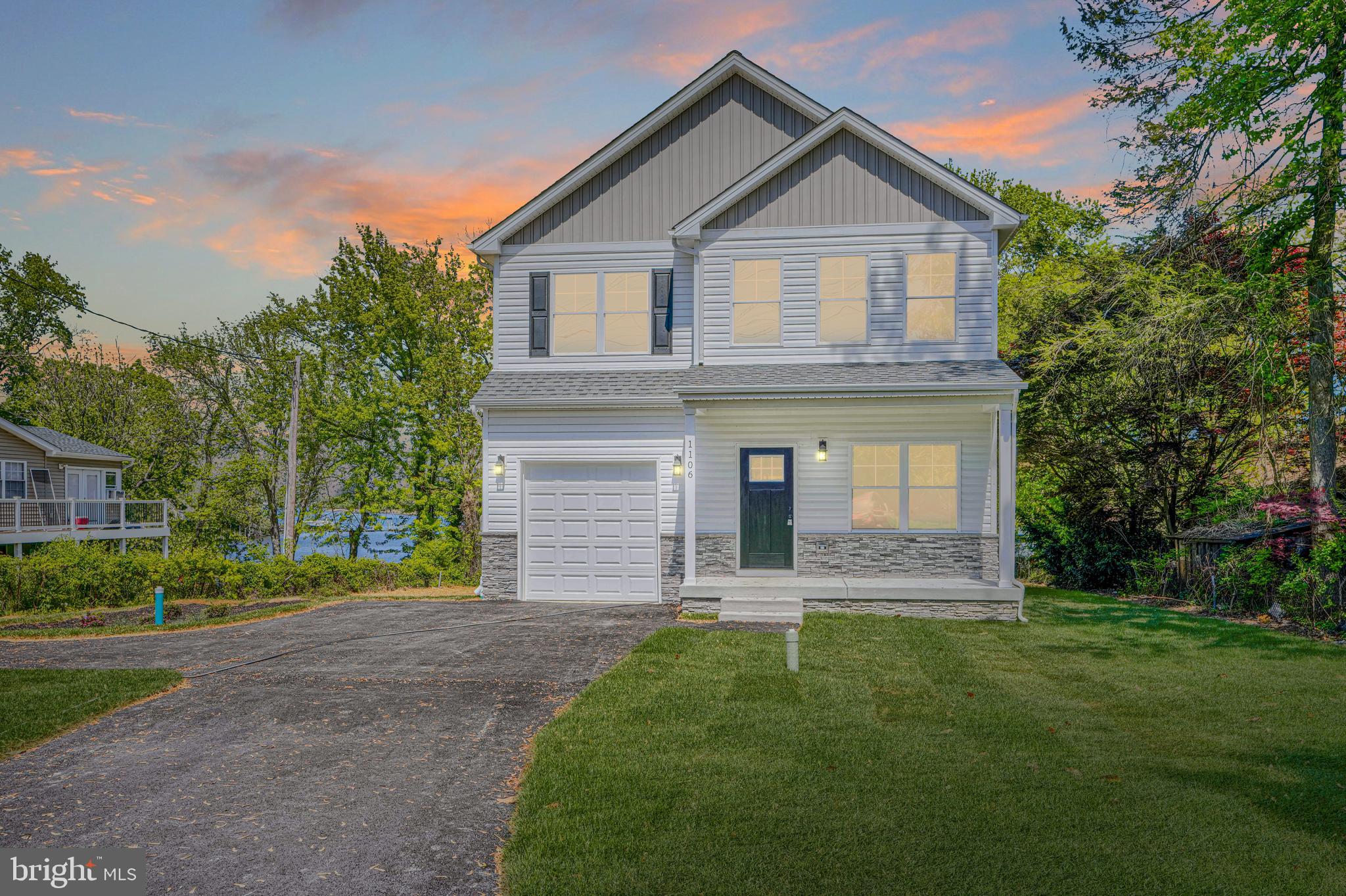 Significant price improvement on this rare opportunity to own a newly built waterfront home on Marley Creek, set on nearly half an acre with wide water views and a level, usable yard. It is difficult to find this combination of newer construction, land, and waterfront lifestyle at this price point.

Natural light fills the main level through expansive rear windows that keep the focus on the water. The layout flows seamlessly from the living area into the kitchen and out to the backyard, creating an ideal setup for both everyday living and entertaining.

Upstairs offers four true bedrooms, including a spacious primary suite with water views. The full-height walkout basement provides excellent flexibility for future living space, recreation, storage, or a home gym and is already roughed in for a future bathroom.

The outdoor setting is what truly sets this property apart. The large yard offers space to expand outdoor living and fully enjoy the waterfront surroundings. As an added bonus, the builder has secured a pier permit that will convey with the property, allowing the next owner to customize their waterfront setup. Estimated water depth at the future pier location is approximately 8 to 10 feet, buyer to verify.

Quietly tucked away while still convenient to major commuter routes, this is a rare chance to own a move-in ready waterfront home with room to grow and make it your own over time.