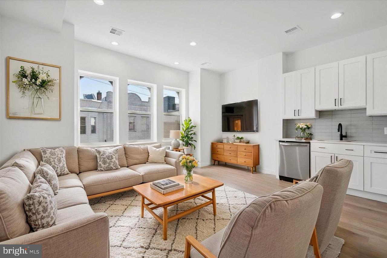Gorgeous and new apartment in the Heart of Queen Village! Spacious and extremely bright corner 2 bed, 2 bath!  This apartment featuring all new hardwood flooring, state of the art kitchen with stainless steel appliances, large open living/dining area, gorgeous bathrooms with shower/tub, LAUNDRY IN UNIT.  Water $50/month, tenant pays electric. Pets welcome for $25/month and a one time non-refundable $250 deposit. Only 1st month and 1 month security deposit needed at signing. Available June 6th.