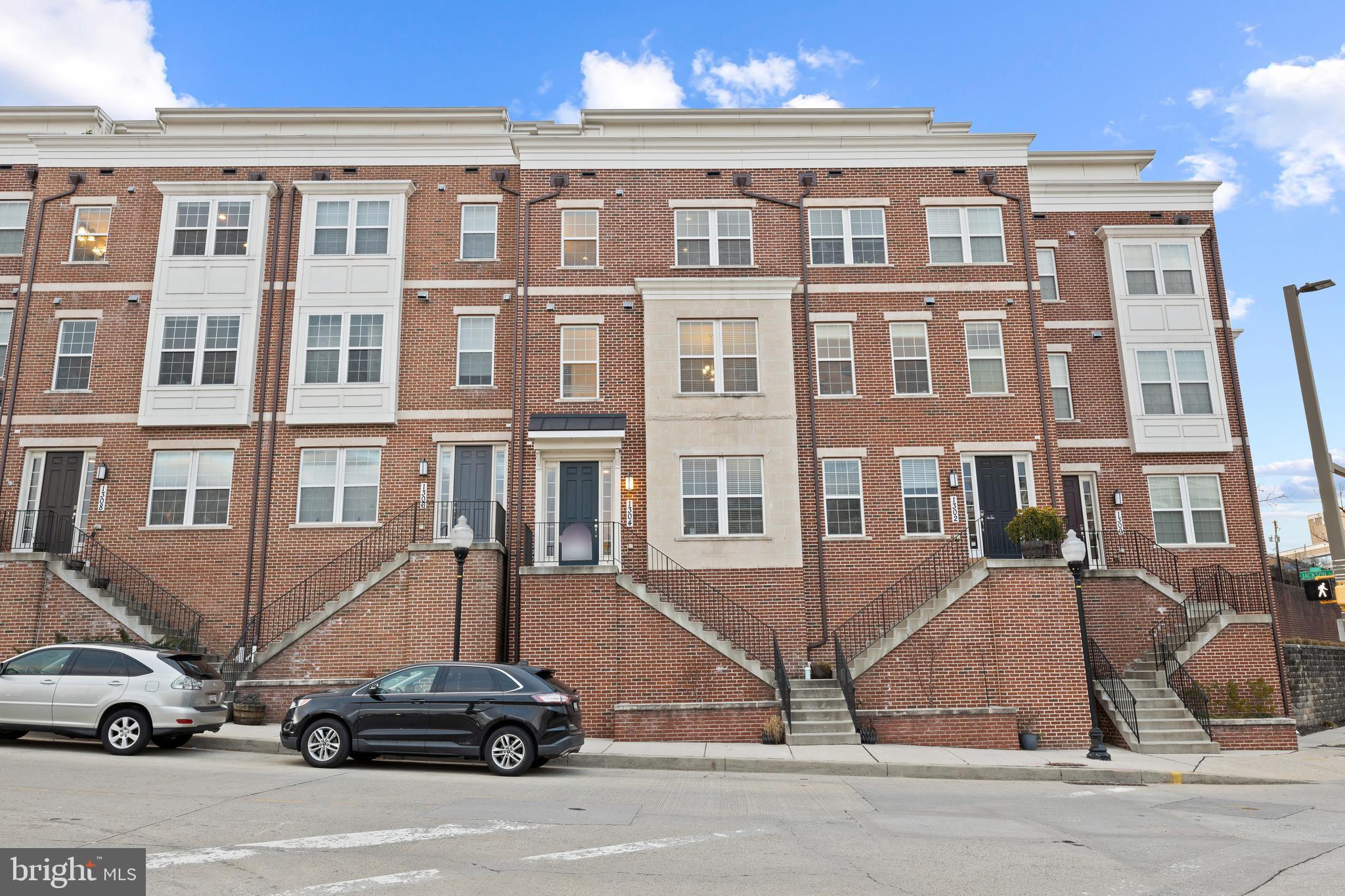 STUNNING FOUR-STORY CUSTOM HOME NOW AVAILABLE IN THE HEART OF FEDERAL HILL WITH OVERSIZED 2 CAR GARAGE PARKING AND 2 CAR OFF STREET PARKING PAD. 2400+ SQ FT. GLISTENING HARDWOODS CASCADE THROUGHOUT. ENJOY CUSTOM CABINETRY, UPGRADED TRIM, IMPORTED TILE, QUARTZ COUNTERTOPS, FRAMELESS GLASS SHOWERS, HIGH END SS GE APPLIANCE PACKAGE IN DESIGNER CHEF'S KITCHEN WITH GIGANTIC 10 FT ISLAND AND PRIVATE BALCONY. TWO GAS FIREPLACES. LOADS OF NATURAL LIGHT. HIGH CEILINGS. TONS OF STORAGE. WALK-IN SHOWERS. CUSTOM BUILT INS. CUSTOM BLINDS. FULL HOME SECURITY SYSTEM. SPACIOUS 3 BEDROOMS WITH 5 TOTAL BATHROOMS. 2 MASTER SUITES. 4TH LEVEL INCLUDES FULL WET BAR AND CAN BE USED AS A LOFT, PLAYROOM, OFFICE, OR ADDITIONAL 4TH BEDROOM. EXPANSIVE WALKABLE DECK WITH GAS FIREPLACE - DUAL USE INDOOR/OUTDOOR. INCREDIBLE WATER AND CITY VIEWS OVERLOOKING THE HARBOR - GREAT FOR ENTERTAINING. CLOSE PROXIMITY TO RETAIL SHOPPING, LOCAL DINING, STADIUMS, INNER HABOR AND ALL MAJOR HIGHWAYS. SCHEDULE A PRIVATE TOUR TODAY.