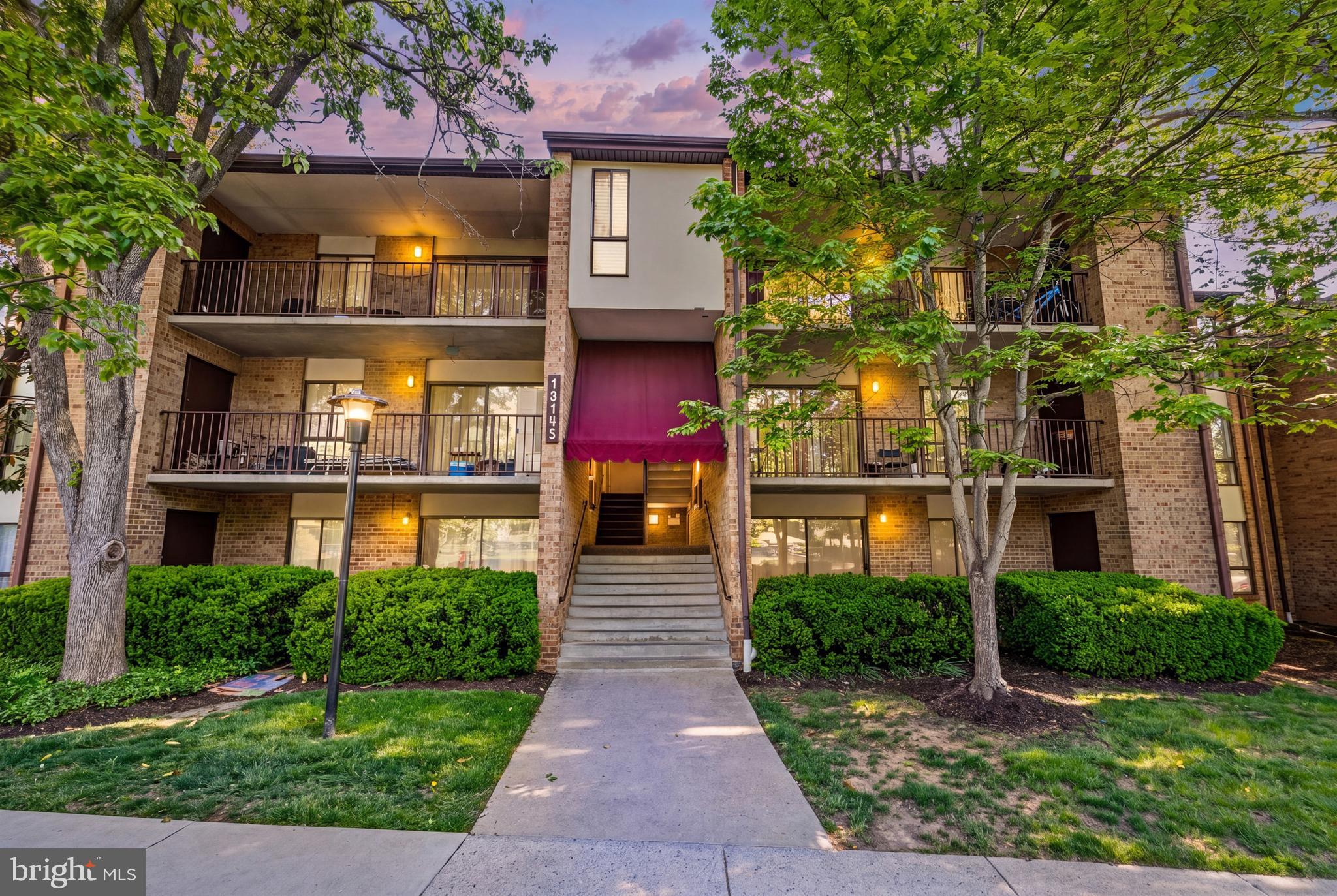 Excellent opportunity to own an affordable and updated three-bedroom, two-full bathroom condo in a superb location. Kitchen updates include stainless steel appliances, granite countertops, and wide plank tile flooring. This eat-in kitchen also delivers a warm & cozy wood burning fireplace, with ample cabinet & storage space. Both bathrooms have been freshly painted and revamped with new toilets and faucets. Stackable front-load Washer & Dryer in unit. Condo amenities include a large & well maintained outdoor pool, assigned parking space, community room, hobby room, exercise room, and additional storage space in the basement. Monthly condo fee also includes water, trash/snow removal, and building/lawn maintenance. Conveniently located within a half mile of Kingsview Village Center, which delivers Starbucks and Giant Food. The exceptional Kentlands Market Square which has endless shopping, entertainment, and dining options is less than a 10 minute drive. Come put your finishing touch on the spacious condo with great potential. Good investment.