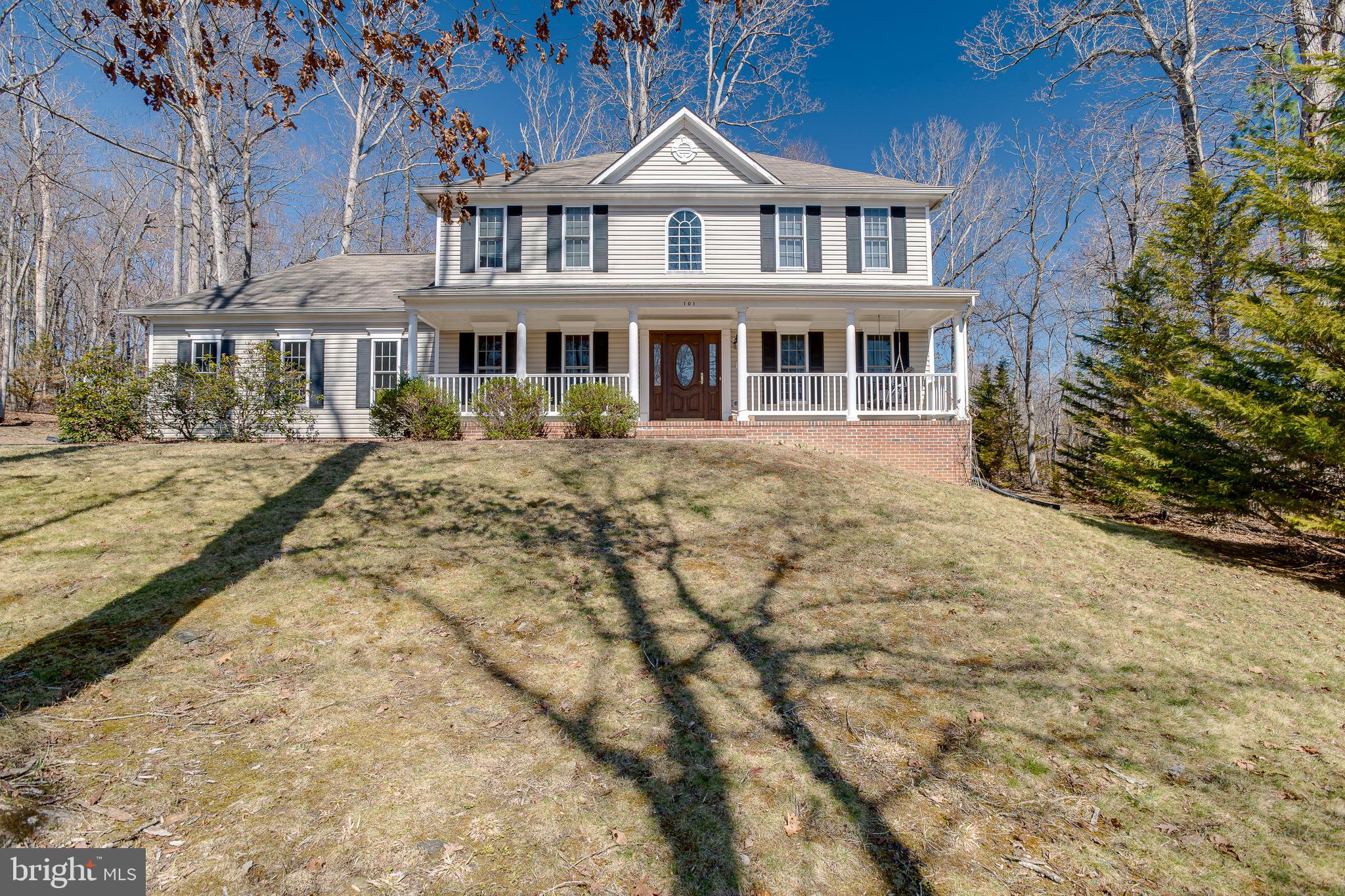 Welcome to this beautiful Colonial tucked away on a quiet private cul-de-sac, offering three finished levels of comfortable living and plenty of space to gather, relax, and entertain.

The inviting main level features gorgeous hardwood floors, a dramatic two-story foyer, and elegant formal living and dining rooms highlighted by a tray ceiling, crown molding, and chair rail accents. At the heart of the home is the spacious eat-in kitchen, complete with rich cherry cabinetry, granite countertops, stainless steel appliances, and an oversized island with bar seating—perfect for casual meals or hosting family and friends. The kitchen flows seamlessly into the cozy family room with a gas fireplace, creating a warm and welcoming space for everyday living.

Just beyond, the sun-filled sunroom features skylights and abundant windows, bringing in beautiful natural light and offering direct access to the large deck overlooking the private backyard—an ideal setting for outdoor dining, entertaining, or simply unwinding.

Upstairs, the spacious primary suite provides a relaxing retreat with a walk-in closet and a luxurious ensuite bath featuring a double vanity and an oversized walk-in shower. Additional bedrooms are generously sized, providing plenty of room for family or guests.

The fully finished lower level expands the living space with a huge recreation room featuring an electric fireplace, a fifth bedroom, full bath, and additional storage.

Additional highlights include a welcoming front porch, main-level laundry/mudroom, oversized garage, ample parking, sidewalks throughout the neighborhood, and a storage shed for extra convenience.

Enjoy resort-style living with access to the community’s exceptional lake amenities including boating, golfing, beaches, swimming pool, and waterfront dining.