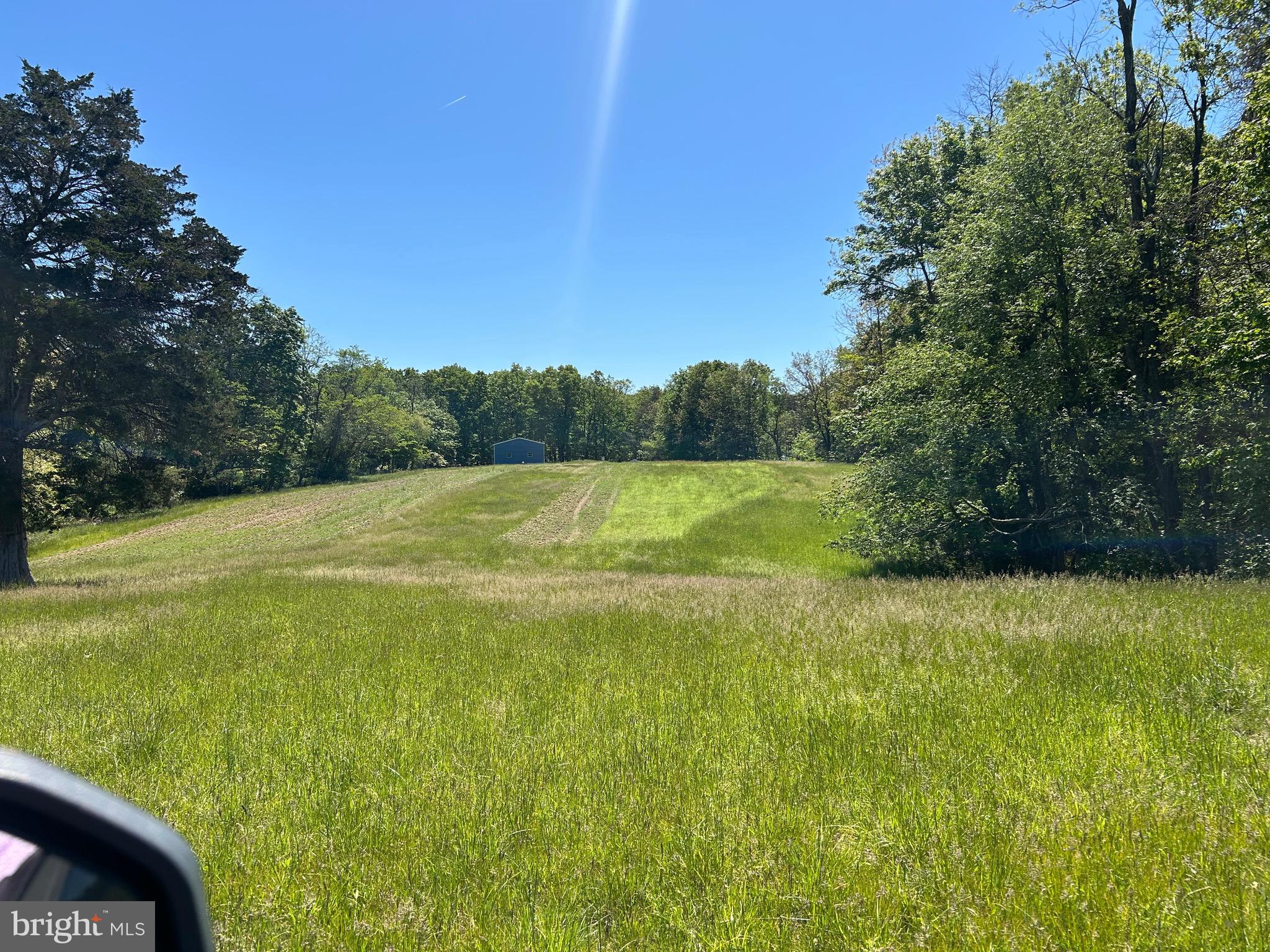 🏡🌲 A Hunter’s Dream Property — Just 25 Minutes from Winchester! 🌲🏡

Discover 33.89 acres of prime hunting and recreational land offering the perfect mix of privacy, wildlife, and natural beauty. Approximately 28 wooded acres feature mature hardwood trees, while 6 acres of pasture provide open space and endless possibilities.
This incredible property has been thoughtfully maintained with established food plots for wildlife and a spring-fed pond, creating the ideal setting for hunting, relaxing, and enjoying nature. The seller has treasured watching deer, bear, and turkey roam the land over the years.
Unlike many mountain properties, this land offers gently sloping to relatively flat terrain, making it easier to enjoy and access. The property was previously approved for conventional financing, though the approval has since expired.
A spacious 30x40 building is included and perfect for storing farm and hunting equipment. Equipment conveys, including:
🚜 John Deere Tractor
🌱 Tiller
🌾 Mower
🪵 Post Hole Digger
🔥 Log Splitter
⚡ 3400 Watt Portable Generator

A bonus — approximately 2,000 adjoining acres are protected in conservation, helping preserve the peaceful surroundings and reducing the likelihood of future subdivision development nearby.

Don’t let this rare opportunity slip away!