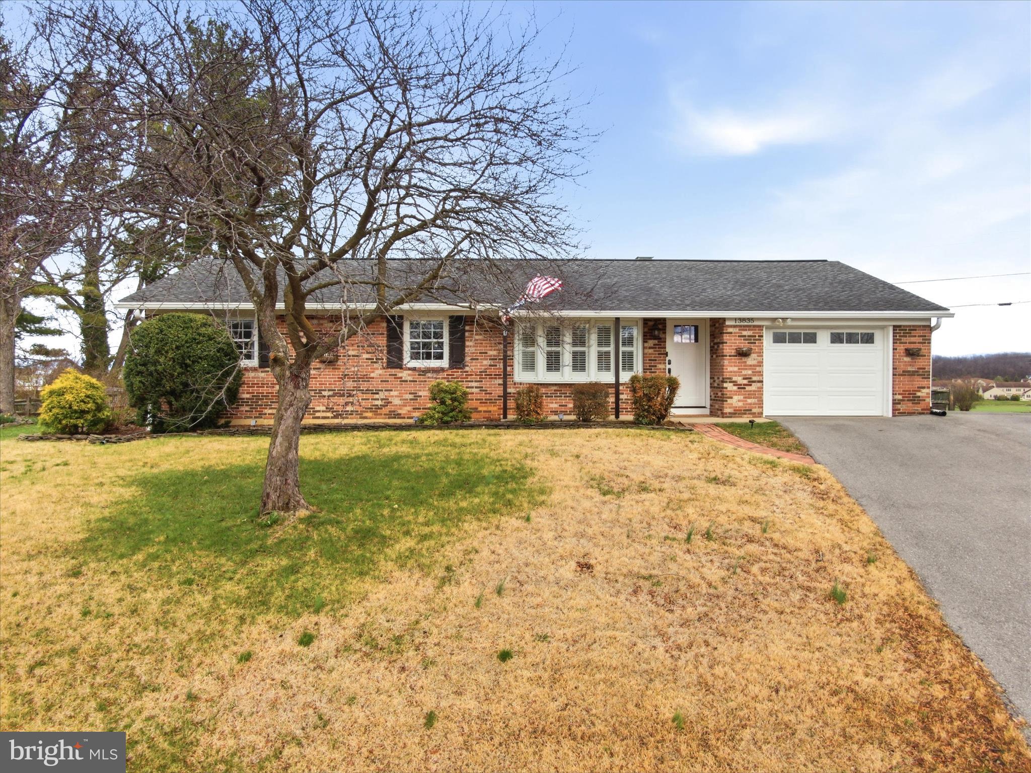 Welcome home to this immaculately maintained four bedroom, two full bathroom all-brick rancher tucked away in one of North End’s most desired neighborhoods. No city taxes and no HOA. Beautiful hardwood floors throughout the main level. The gourmet kitchen features granite countertops, stainless steel appliances, a spacious pantry, and plenty of cabinet and useable counter space. The primary bedroom has a private bathroom with a large walk-in shower. Downstairs, the partially finished basement adds valuable living space with a fourth bedroom, a cozy family/rec room, and an expansive storage area. Enjoy the convenience of an attached oversized one-car garage. Take in the stunning views of mountains and pastures from the covered back patio. Ideal commuter location within less than a mile to I-81 and the Pennsylvania state line. Close to shopping and restaurants. This home truly checks all the boxes. Schedule your showing today!