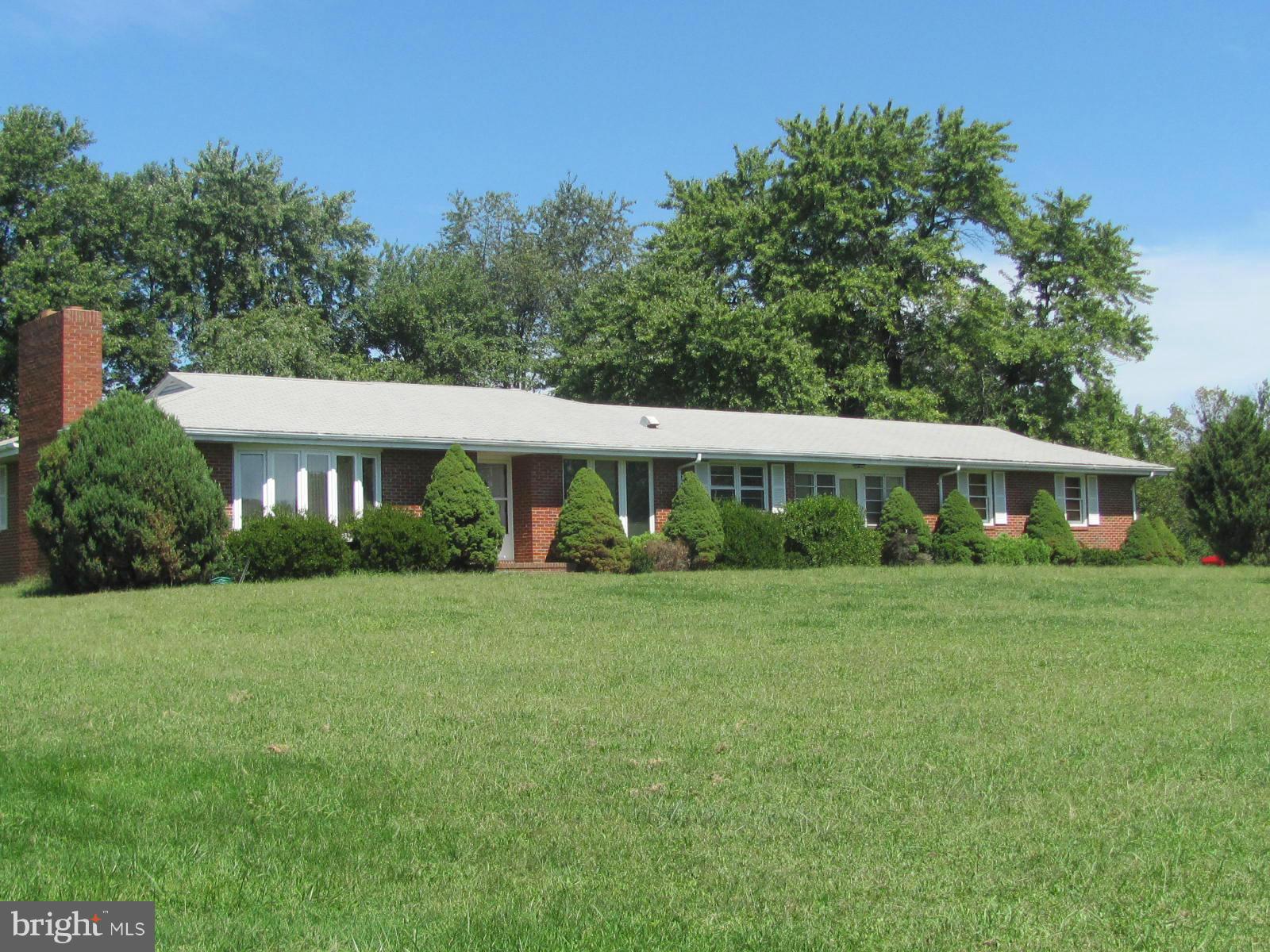 Private 2 Bedroom Brick Rancher Nestled in most convenient location featuring REMODELED KITCHEN w/ lovely HARWOOD FLOORS and brick hearth FP+ 20X12 HEATED/COOLED  SUN PORCH w/ attached 2 car GARAGE! Basement has been NEWLY CARPETED!. Landlord pays for water bill and will mow up to 30 feet around perImEter of home and while tenant plows own drive, landlord mows entry drive to street. AVAILABLE NOW!