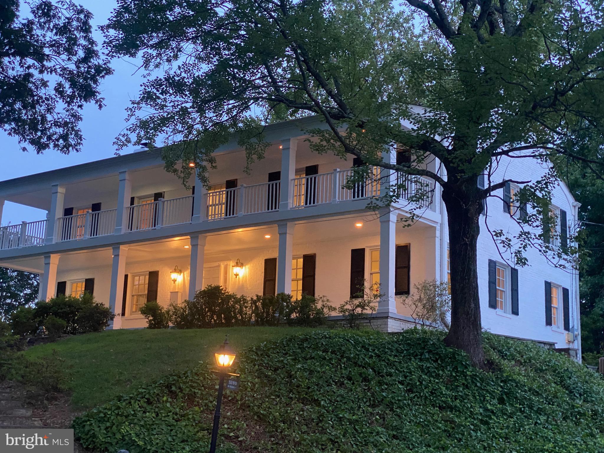 OPEN SUNDAY 9/15 1-3pm.  CC HILLS: SOLITUDE, SPACE, GREENERY, GOLF & STUNNING, HILLTOP VIEWS! Gracious Southern Colonial on one of the prettiest streets and quietest sections of Country Club Hills. Get up every morning to views reaching from Downtown Bethesda to the Washington Monument, with winter views of the National Cathedral and the spires of Wisconsin Avenue. Then end the day with a cold drink, relaxing on the double balconies up amidst the treetops. Surrounded by properties valued much higher, from $3.5 million to $8 million, it’s just steps from the fairways at Washington Golf & CC, and a short walk to its driving range, pool and clubhouse. The interior too, will remind you of elegant, Southern styling, like the best of Savannah and New Orleans. You’re greeted by a classic foyer and staircase, with a floor plan designed for entertaining. It offers both a formal dining room and a casual eating space, a living room, a completely remodeled powder room with a marble floor, and a particularly spacious family room with a wood-burning fireplace. The large, light-filled kitchen has a new 42” Sub Zero refrigerator, a double oven, island, and all stainless steel appliances. Upstairs, the bedrooms all include en-suite, full baths, and all of the baths have been recently remodeled. The oversized, primary bedroom boasts three closets, including two walk-ins, and the primary bath includes a double vanity with a marble countertop, a rain shower, two hand-helds, a soaking tub, and a marble floor. On the lower level, there’s ample space for activities or just more relaxing in the rec room, which also opens to the side yard. It includes a fireplace, and it’s next to the fourth bedroom, which has its own en-suite, full bath and is perfect for an au pair or out-of- town guests. The house has been freshly painted, both inside and out, and it has hardwood floors on each of the three levels. Outside, the back patio’s ideal for grilling and entertaining, and the whole property’s surrounded by towering oaks, flowering trees, azaleas, roses, and daffodils that will keep the yard blooming from March to November. There's room to expand and space for a swing set, a trampoline, and a pool. It’s so quiet, wooded, and filled with nature that you’ll find it hard to believe you’re only five minutes from D.C. and ten minutes from Georgetown. Eight miles from Reagan National Airport, with easy access to GWParkway, I-66,Tysons,Bethesda,Alexandria, and National Landing. Jamestown, Williamsburg, and Yorktown schools.