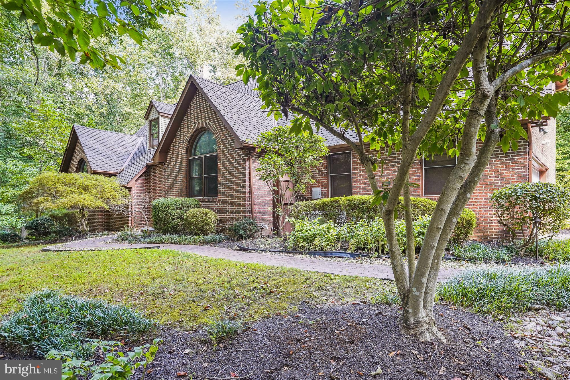 **VERY relaxed HOA** Don't miss this unique gem located on 5.65 Acres in Nokesville. Enjoy the serenity of the landscape or maybe a hobby farm- plenty of options to make it your own! Located in a cul-de-c-sac, this custom built home has 5300 SF of living space with charming amenities and upgrades.  This Beautiful home, with French Colonial architecture, is nestled on private, wooded acreage. This home has a pool, hot tub, whole house generator, 2023 water system, 2022 well pump, 2019 Trane HVACs, and more!  The exterior façade blends into the wooded lot with a natural, subdued color palette. The multi-level deck leads down to a free-form pool surrounded by an oversized pool-deck and lush landscape. There are retaining walls, extensive hardscape and landscaping with lighting, a shed, a barn, fencing, and the list goes on!  Looking over the rear deck you can easily see a lovely stream meandering through the property. Inside has a **main level primary suite with updated bath AND radiant floors** and a private entrance to the expansive deck. The eat-in kitchen with breakfast bar has been renovated with upscale cabinets, granite, and SS appliances. Great room with vaulted ceiling, formal dining room with two-story ceiling, and breakfast/gathering room with windows galore. Upstairs has three HUGE bedrooms- one bedroom is an ensuite with a private bathroom, while the other two bedrooms share an oversized Jack and Jill style bathroom.  Fully finished basement with a NTC bedroom/den/flex room, full bath, laundry room, a tiled Florida room, and a rec room.  More details to come!  *Check out the Uploaded Video*