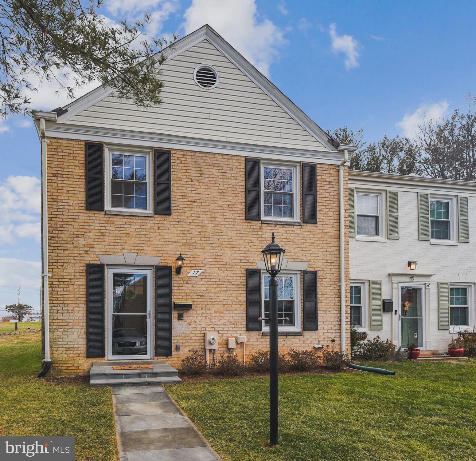 Offers due Monday 7PM. Welcome home! You'll love this spectacular brick end unit townhouse with exquisite updates and renovations throughout the entire house. Over 2,100 sqft of living space on 3 levels. Enjoy the completely remodeled open concept gourmet kitchen with white custom cabinetry, stainless steel appliances, quartz countertops, and new lighting! Have your meals at the large kitchen island or in the elegant dining room. Find comfort in the light filled family room with a wood burning fireplace. Hardwood floors on main level and new premium laminated flooring in the lower level. The upper level offers 3 sizable bedrooms with ample closet space and 2 beautifully updated bathrooms. Head downstairs to a spacious recreation room with a built in wet bar and second half bath!  Exit the new French doors from the main level to your new flagstone patio and fenced in backyard. This lovingly cared for home is more than move in ready and has spared no detail!