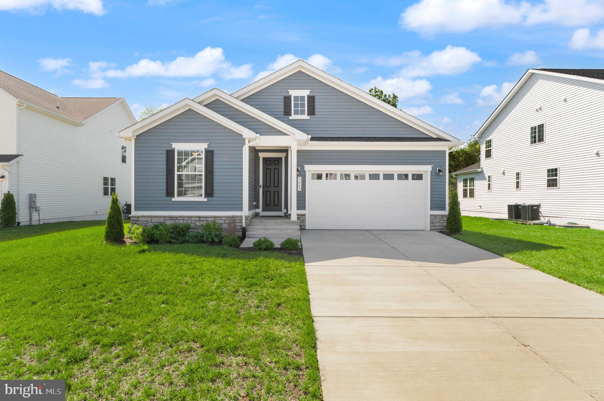 Welcome to this beautifully designed home in the sought-after Foxhaven community of Bealeton, offering over 2,800 square feet of modern living space with a bright, open feel throughout.

The thoughtfully designed floor plan features 3 bedrooms, 2 full bathrooms, and spacious living areas perfect for both everyday comfort and entertaining. The light-filled interiors create an inviting atmosphere with a contemporary style and versatile spaces to fit today’s lifestyle.

The fully finished basement provides incredible flexibility with space for two additional legal bedrooms and a full bathroom, making it ideal for guests, a home office, recreation space, or multi-generational living. The basement also includes a rough-in for a future wet bar and a large storage room, adding even more potential.

Enjoy peaceful outdoor living on the covered patio overlooking a private, tree-lined backdrop — the perfect setting for relaxing or entertaining. Combining modern finishes, generous living space, and a desirable location, this Foxhaven home offers the perfect blend of comfort and convenience.
