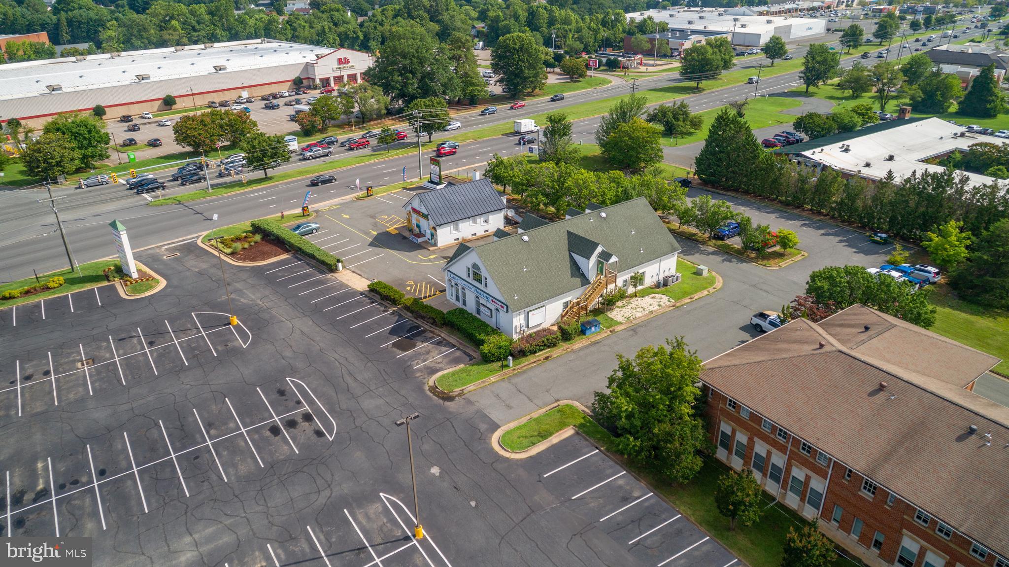 3916 Plank Rd is a rare, single-tenant commercial asset positioned at the crossroads of visibility, traffic, and retail synergy in Fredericksburg’s highly sought-after Plank Road corridor. Currently built out for medical use, the property’s C2 zoning provides flexibility for a wide range of uses, including retail, office, wellness, and other service-based businesses, making it an ideal choice for owner-users seeking a high-traffic, high-visibility location to grow their business. This freestanding property is being sold vacant, allowing a purchaser to immediately customize the space to meet their operational needs without the constraints of an existing tenant in place.