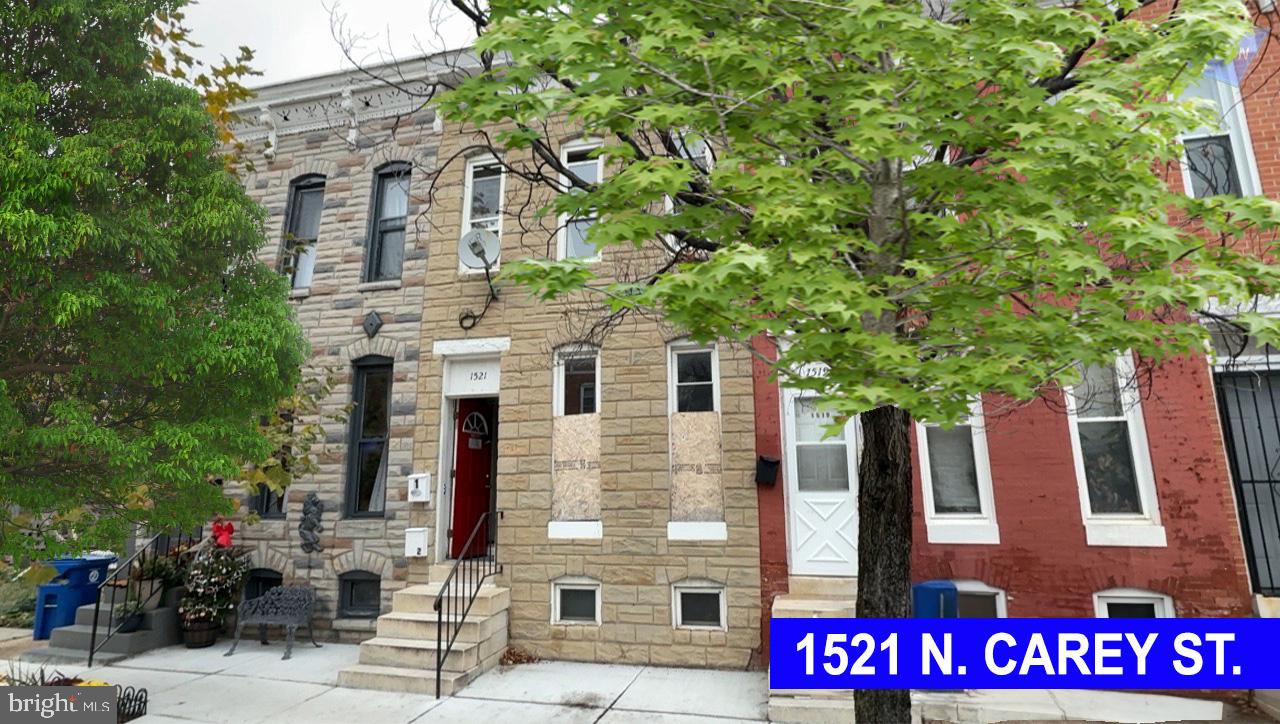 Brick interior rowhome, offering a classic Baltimore layout with two bedrooms and two full bathrooms across multiple levels. Built in 1900, this property features a traditional rowhome design with basement, forced-air natural gas heat, and public utilities. Property is in average condition and presents an opportunity for renovation and value-add improvements. Interior layout supports functional living space suitable for owner-occupants or investors. Convenient city location with access to major routes, neighborhood amenities, and public transportation. Property is being sold as-is.