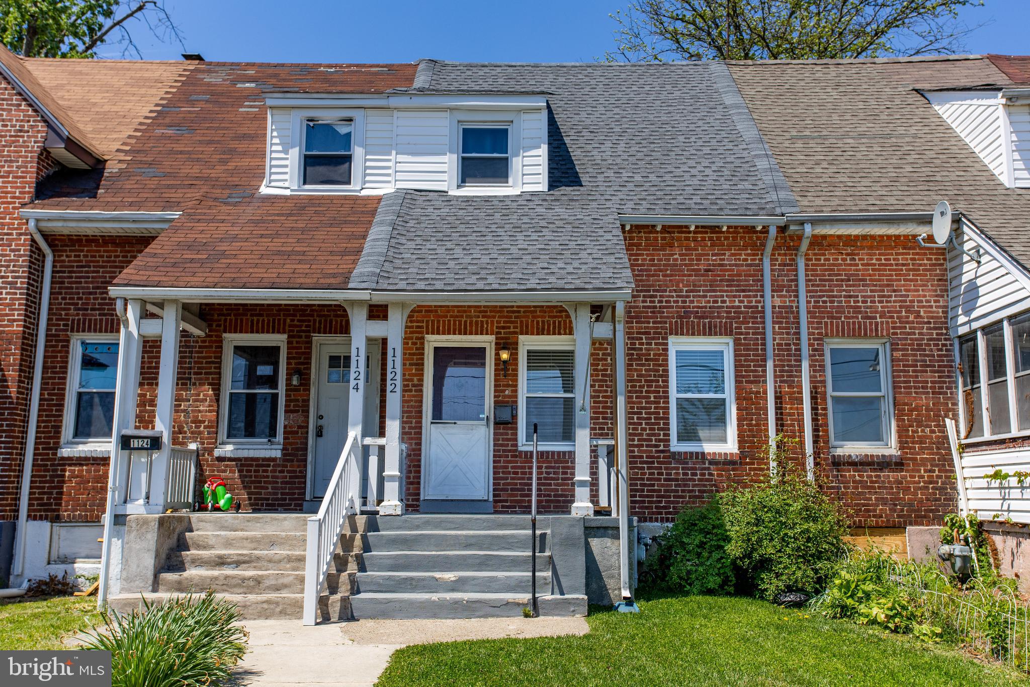 Welcome to 1122 W Ridge Road, a 2-bedroom, 1-bath rowhome in Marcus Hook. A short set of steps leads to the front entrance. Inside, the living room features two front-facing windows that bring in natural light, along with a staircase to the second level. The space flows into the kitchen, which includes granite countertops, a peninsula with seating, stainless steel appliances, and direct access to the backyard. A convenient laundry closet with a stacked washer and dryer is located just off the kitchen. Outside, the patio offers space for seating or a small table, along with a generously sized grassy yard, ideal for relaxing or outdoor use. Upstairs, the full bathroom includes tile flooring, a tub and shower combination, and a single sink vanity. Two bedrooms with carpet flooring complete the second level. Conveniently located near local restaurants, shopping, grocery stores, and more, this home also offers easy access to I-95, Philadelphia International Airport, and Center City. Don’t miss the opportunity to make 1122 W Ridge Road your new home.