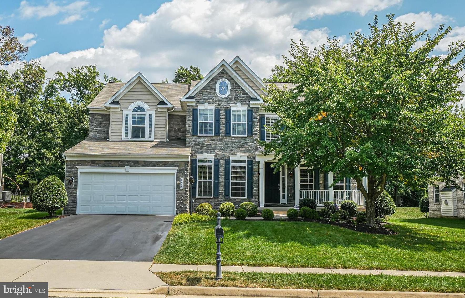 METICULOUSLY updated and maintained Vanderbilt model home in the highly sought after Regents at Lake Manassas community. Property is TURNKEY, SHOWROOM-READY on one of the nicest lots backing up to woods. 5564 finished sqft, 6 Bedrooms, 4.5 Bathrooms, plus a main level office. Be sure to see the detailed PROPERTY FEATURES/IMPROVEMENTS SHEET for full list of remodeling and improvements by current owners.  Enter on the main level to a two-story foyer w/ gleaming hardwood floors. A formal living room and elegant dining room are enhanced by crown molding, chair rail and shadow boxing. The chef’s kitchen boasts a new suite of KitchenAid appliances, incl. double wall oven, 5 burners gas cooktop, and new exhaust hood, an oversized island, 42” cabinets, and natural stone backsplash. A butler’s bar and pantry provide plenty of additional storage. Next to the kitchen is a sun-drenched breakfast room w/ vaulted ceilings and walk-out access to backyard w/ stamped concrete patio with built in fire-pit. The great room incl. a stone-front gas fireplace and in-ceiling home theater surround sound. Double doors open to a private office. The main level also incl. laundry/mud room with front-loading W/D, utility sink, built-in cabinets, and garage access. 2-Car garage w/ new insulated garage door, smart garage opener, and separate AC / Dehumidifier unit. A dual staircase leads upstairs to luxurious primary suite w/ spacious walk-in closet and custom California Closets, The ensuite bath incl. a marble vanity, large soaking tub, oversized shower, and a private water closet. 4x additional BR and 2x full BA complete the upper floor. The finished lower-level w/ new LVP Oak floors incl. a large rec room and walk-up access to the backyard as well as a 2021 fully permitted bathroom addition, guest bedroom, bonus finished flex room and large utility / storage area.  New 80 Gallon Hot Water Heater (2024).  Located just minutes from Wegmans, shops, dining, vineyards and more.