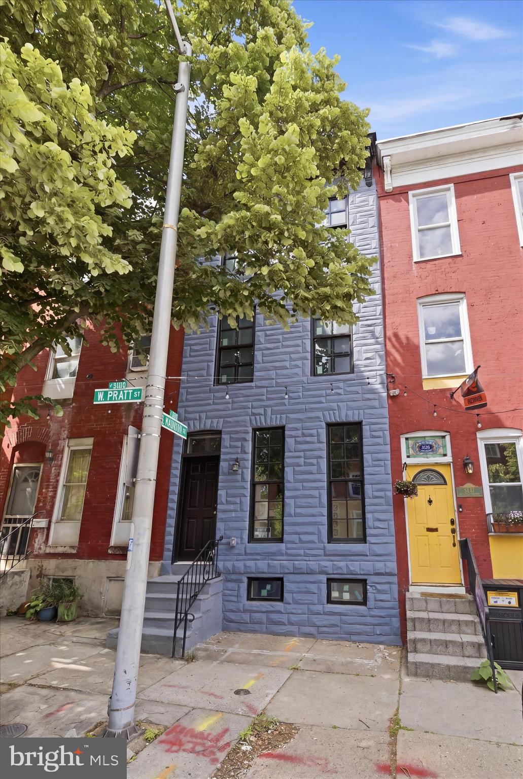 NEW LOW PRICE!!! Welcome Home!!!!  This stunning Baltimore City modern row home, provides warmth and all the we are home feels! The main level has beautiful exposed brick walls and paired with wood floors that create a warm, inviting atmosphere. Updated recessed lighting throughout enhances the spacious open layout, perfect for comfortable everyday living and entertaining. The kitchen features sleek stainless steel appliances, ample cabinet space, and a cozy nook ideal for dining. This home boasts with four bedrooms, three full bathrooms, and one half bathroom, provides plenty of room to relax and unwind. The bathrooms are thoughtfully updated with modern finishes. Two upper levels provide flexibility for work, recreation, or guest accommodations, offering endless possibilities. This home provides city living  in Baltimore City location,  but with a touch of luxury that you cannot deny. Come see this home today before it is gone!