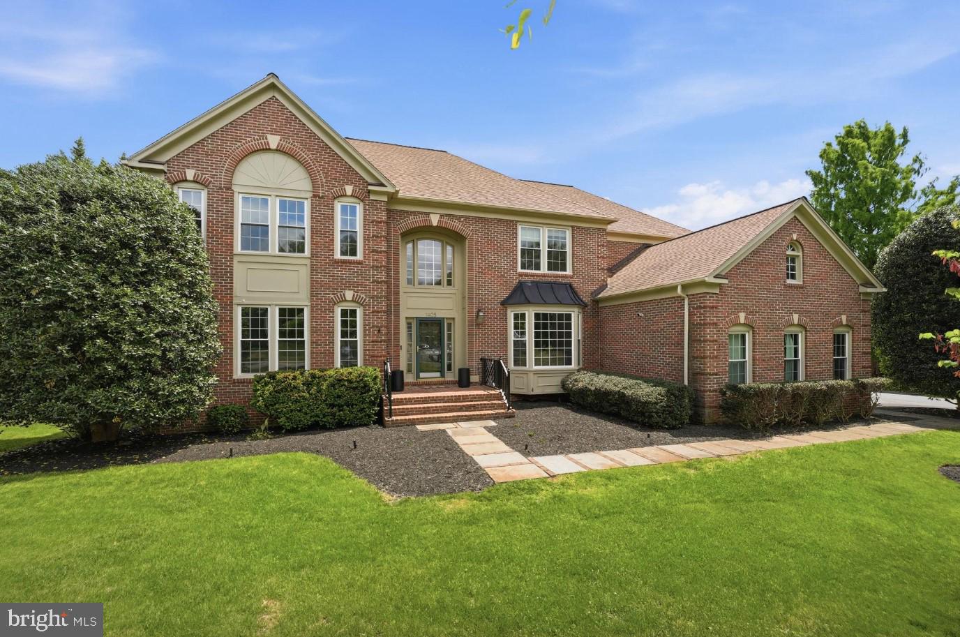 Rare opportunity to own this beautifully renovated Colonial in the highly sought-after McLean Hundred community, within the prestigious Langley High School pyramid. Situated on a premium nearly 0.6-acre lot, this elegant three-sided brick residence offers approximately 6,200 square feet across three finished levels, featuring 4 bedrooms, 4.5 baths, a walk-out lower level, and a desirable 3-car side-load garage.

Extensively renovated (major renovation in 2026) and move-in ready, the home has benefited from substantial recent improvements, including a fully renovated kitchen, all three upper-level bathrooms, newly installed hardwood flooring throughout the upper level, fresh interior paint, updated lighting and recessed lighting, replacement windows, insulated garage doors, an upgraded sprinkler system, newer upper-level HVAC, and a newer water heater, washer, and dryer.

A grand two-story foyer with a sweeping curved staircase welcomes you into a thoughtfully designed floor plan featuring formal living and dining rooms, a private office with custom built-ins, a bright sunroom, and an expansive family room with a fireplace. The family room opens seamlessly to a large deck overlooking mature trees and the fully fenced backyard, offering exceptional privacy and ample space for a future swimming pool.

The renovated gourmet kitchen serves as the heart of the home, showcasing custom cabinetry, quartz countertops, a large center island with downdraft cooktop, abundant storage, and a spacious breakfast area surrounded by windows that fill the space with natural light. A main-level laundry room with its own exterior entrance adds everyday convenience.

The upper level has been extensively updated and features newly installed hardwood flooring throughout, three beautifully renovated bathrooms, and designer lighting. The luxurious primary suite offers a sitting area, dual walk-in closets, and a stunning spa-inspired bath. An en-suite bedroom with custom built-ins and two additional bedrooms connected by a renovated bath complete the upper level.

The walk-out lower level provides exceptional flexibility with a spacious recreation room featuring a fireplace and bar area, an updated full bath, a bonus room ideal for a home office or gym, and generous open space for entertaining, recreation, or a game room.

Combining timeless architecture, extensive renovations, a premium lot, and an exceptional McLean location, this turnkey residence presents a rare opportunity in one of Northern Virginia's most desirable neighborhoods and school pyramids.