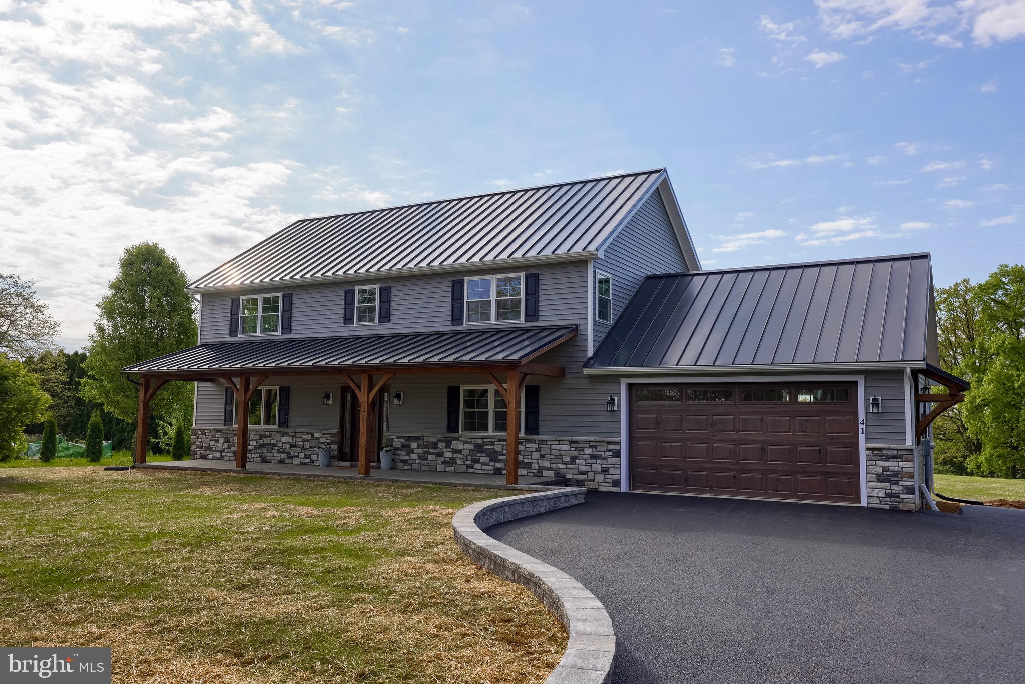 Brand new construction without the wait! Move right in and start living!  Located down a private road, in the desirable area of Easter Lebanon County.  This thoughtfully designed home offers the perfect blend of style, comfort, and convenience. Residents enjoy walking trails, a community park, and easy access to restaurants, shopping, entertainment, and major commuter routes throughout Lancaster County. Offering 2,397+ square feet of living space, this home stands out with quality craftsmanship and high-end finishes throughout. The main level is filled with natural light and features stained wood beams, upgraded LVP flooring, and a spacious layout ideal for everyday living and entertaining. The kitchen with appliances, custom cabinetry, an oversized island, and a walk-in pantry with built in shelving.  A dedicated office or flex room on the second level offers additional versatility. Upstairs, you will also find 2 generously sized bedrooms, one full bathroom,  and a large rec room for additional living space.   The primary suite features a large walk-in closet with built in shelving, and a beautifully finished bath.  Laundry is conveniently located on the first floor with other closets for storage!  The unfinished basement allows for extra storage along with the very large garage in the back yard that could be used for storage or made into a shop or game room.  It has endless potential for future living.  Outside, enjoy a private backyard setting with deck.  Call today to schedule your private showing!