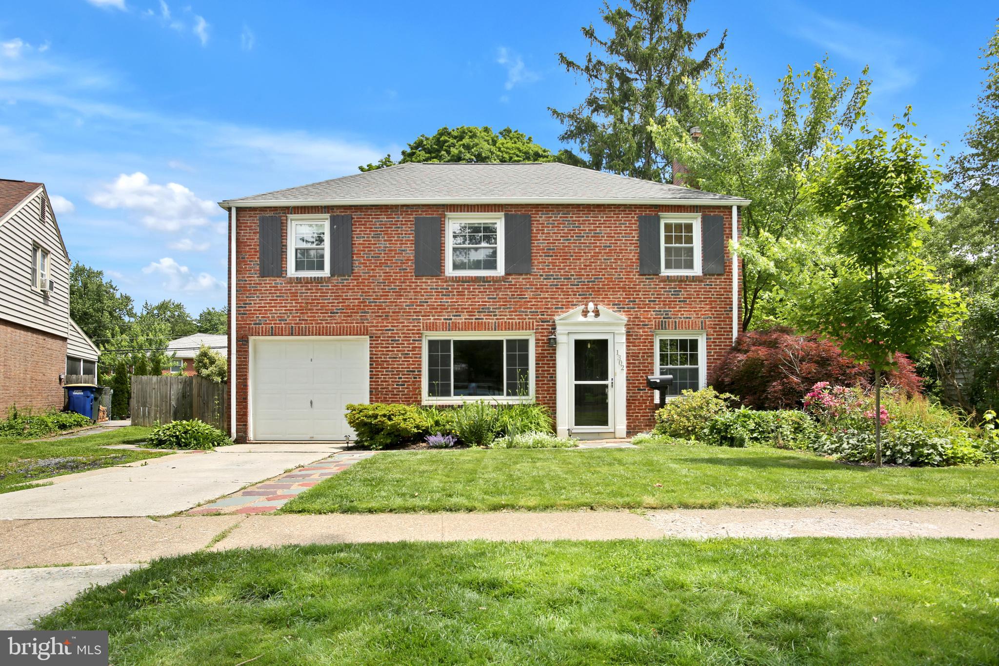 Welcome to Highland Park! This beautiful brick traditional 2-story home offers timeless charm, outstanding outdoor living, and an unbeatable location directly across from the community park. Homes in this development don’t last long! Inside, you’ll find hardwood floors throughout most of the home, a spacious living room with a cozy wood-burning fireplace, formal dining room, and an updated kitchen featuring granite countertops and stainless steel appliances. The impressive family room addition provides even more living space and includes a gas fireplace along with a convenient half bath. Upstairs offers 3 comfortable bedrooms and a full shared bath, while the partially finished basement adds valuable flexible space perfect for a rec room, home office, gym, or play area. Outdoor living is where this home truly shines! Enjoy relaxing or entertaining from the screened-in porch, paver patio, and huge deck overlooking the large fenced backyard complete with a gazebo and children’s playset. Additional highlights include a 1-car garage, updated roof (2016), updated gas heating system (2025), and convenient access to shopping, schools, restaurants, and major highways for an easy commute. A rare opportunity to own a move-in ready home in one of the area’s most popular neighborhoods!