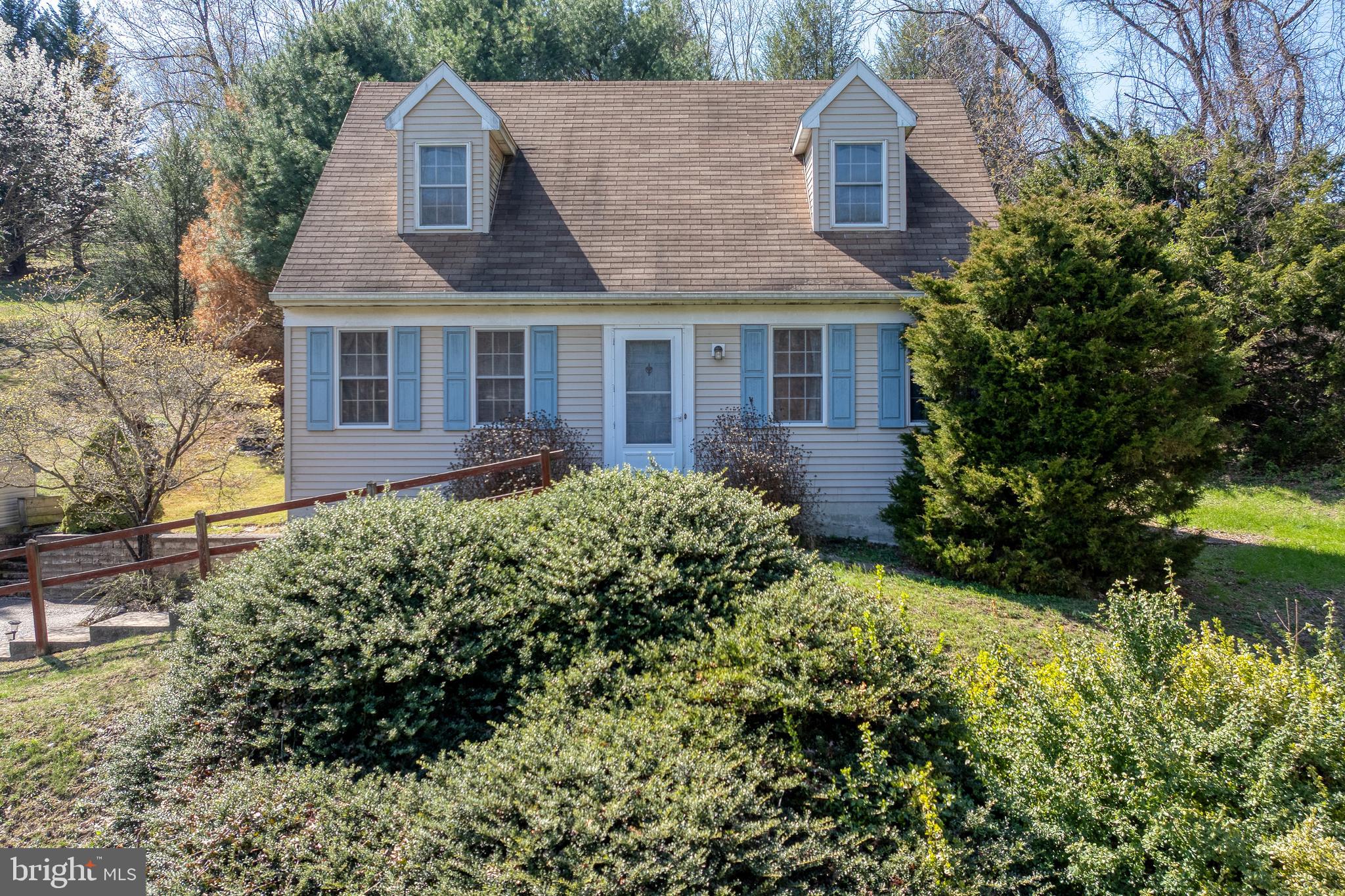 Nestled in the heart of nature, this property sits on a 1 acre lot in Penn Manor School District and offers a peaceful retreat and a chance to create something of your own.  Surrounded by mature trees and landscaping, this home is perfect for the buyer who sees beyond the surface and is ready to breathe new life into the home.  Two bedrooms are located on the main level, with an additional bedroom on the 2nd level.  The kitchen and dining area provides access to the back deck.  The finished lower level adds extra family space and access to the garage.  All appliances are included with the sale.  The home is being sold as-is.
