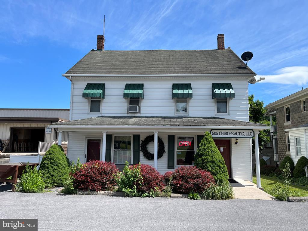 Great investment property!  Don't miss this opportunity to own a multi-unit property on busy Electric Avenue in Lewistown.  The first floor is currently owner occupied as a Chiropractic Office with a dorm-style air B & B rental in the back of the 507 side.  The second floor has 2 additional apartments.  There is parking available both in the front and back of the building.  Call the listing agent today to schedule a showing.