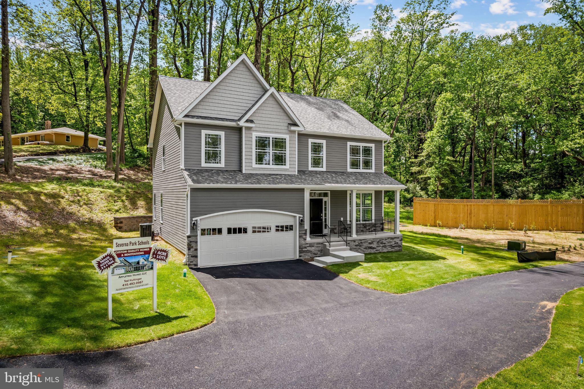 NEW CONSTRUCTION.!!!  SEVERNA PARK SCHOOLS!!!     6.7 Miles to Route 50,  1 .15 Acre+ wooded lot!!! 5 Bedrooms 3.5 Baths.    9-Foot Ceilings on 1st Floor.    Beautiful Custom Kitchen with Quartz Countertops,  Stone Backsplash,  42" Cabinets, Stainless Farm Sink.  Large Custom Tiled Primary Bath Shower with Custom Glass Enclosure!!  City Water,  2 Car Garage.   Double Pane Insulated Windows.  Zoned Trane HVAC Equipment!!   Fire Suppression System.    2nd Floor Laundry Room complete with washer and dryer!! Direct Private Access to the B&A Trail!!!.