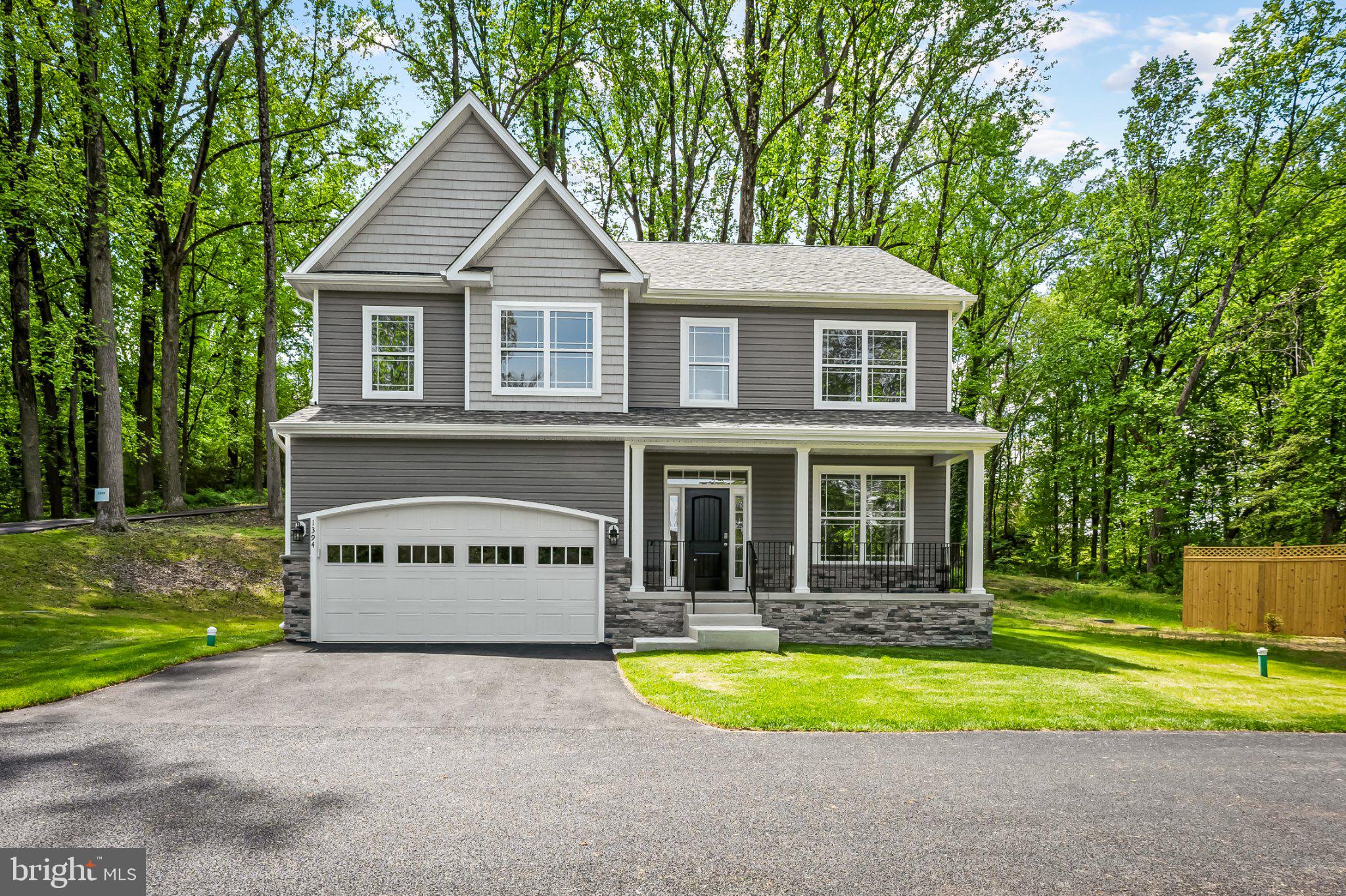 NEW CONSTRUCTION.!!!  SEVERNA PARK SCHOOLS!!!     6.7 Miles to Route 50,  1 .15 Acre+ wooded lot!!! 5 Bedrooms 3.5 Baths.    9-Foot Ceilings on 1st Floor.    Beautiful Custom Kitchen with Quartz Countertops,  Stone Backsplash,  42" Cabinets, Stainless Farm Sink.  Large Custom Tiled Primary Bath Shower with Custom Glass Enclosure!!  City Water,  2 Car Garage.   Double Pane Insulated Windows.  Zoned Trane HVAC Equipment!!   Fire Suppression System.    2nd Floor Laundry Room complete with washer and dryer!! Direct Private Access to the B&A Trail!!!.