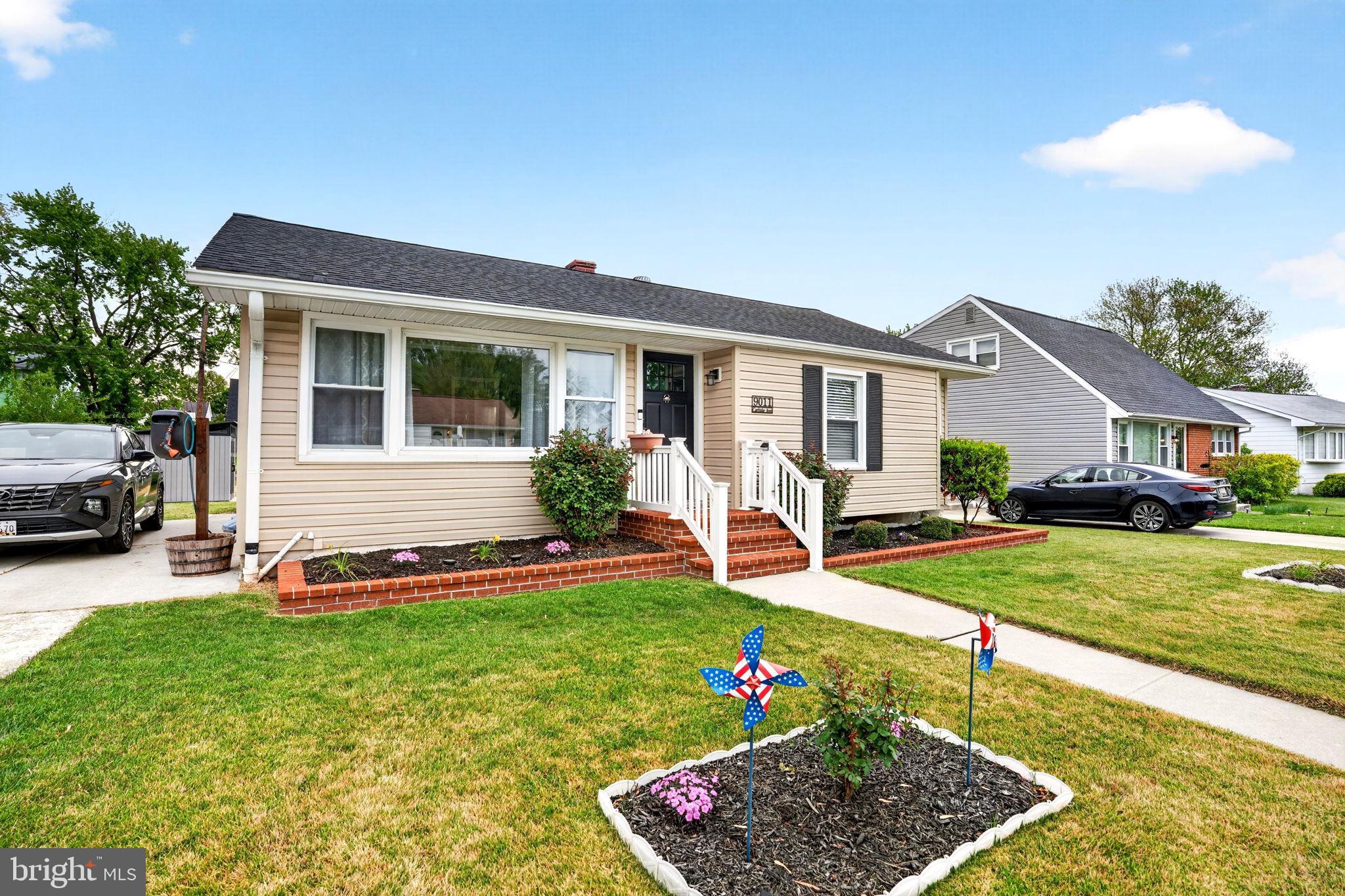 Nestled in the serene enclave of Joppa Vale, this charming ranch-style home blends timeless character with modern comfort. Built in 1959 and meticulously maintained, the residence offers 1,568 square feet of thoughtfully designed living space, ideal for both everyday living and effortless entertaining. Step inside to a warm, inviting atmosphere —perfect for cozy evenings with family and friends. Refinished hardwood floors add elegance and continuity throughout the main living spaces, while plush carpeting and ceramic tile provide both comfort and style. The designer kitchen serves as the heart of the home, featuring sleek quartz countertops and a layout that flows seamlessly into the living and dining areas. The home offers three spacious bedrooms that serve as peaceful retreats, along with two full bathrooms appointed with tasteful, modern finishes. Downstairs, the fully finished basement expands your living space with heated floors and convenient walkout access, creating the perfect setting for recreation, a home office, or a private getaway. Thoughtful updates enhance peace of mind, including updated mechanical systems, whole-house waterproofing, and exterior improvements completed in 2017.
Outside, a beautifully landscaped yard provides a tranquil backdrop for outdoor gatherings or quiet moments of relaxation. Located in the sought-after community of Joppa Vale, this home offers a lifestyle defined by comfort, charm, and understated luxury. More than just a house, it’s a place where lasting memories are made—and where you’ll truly feel at home.