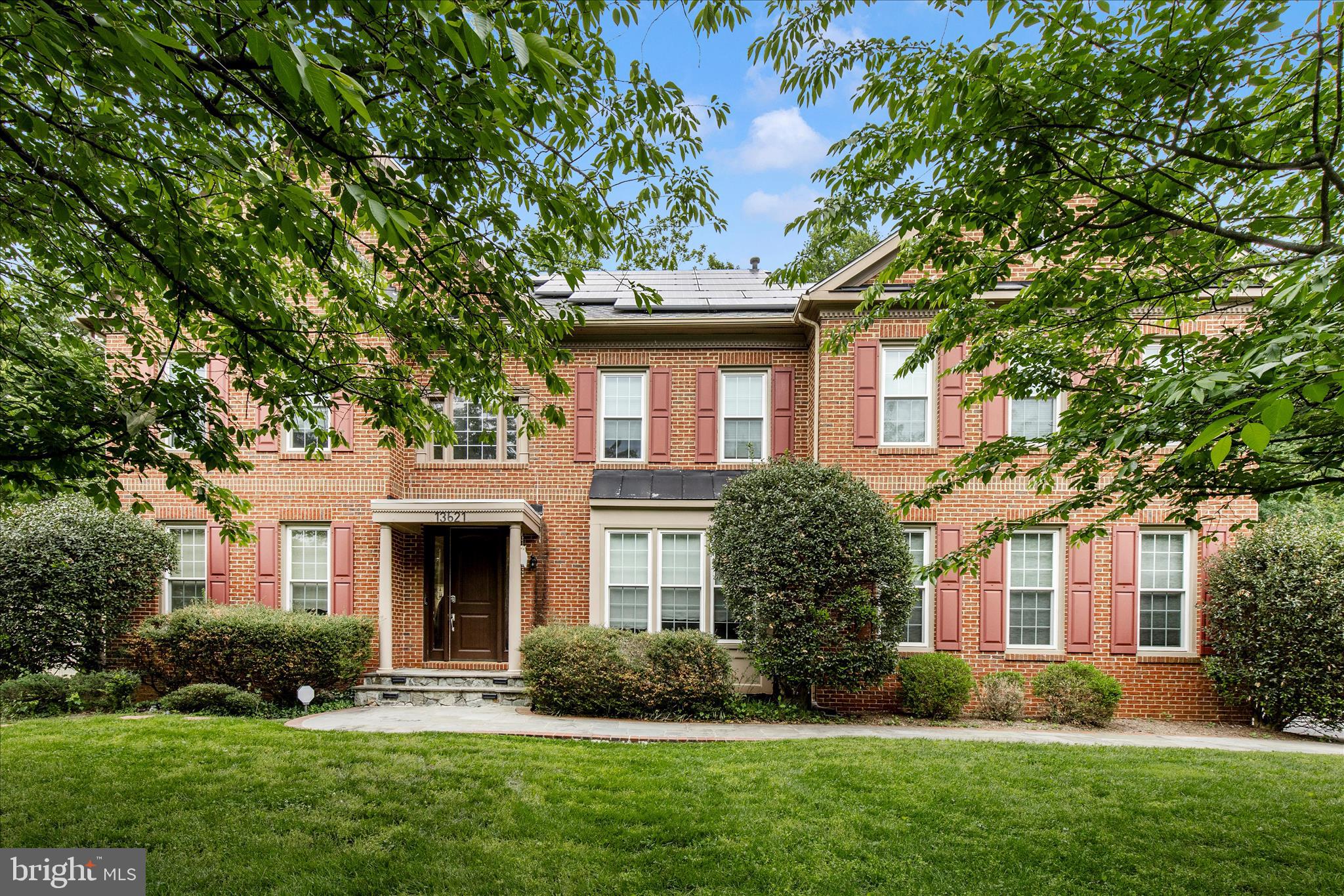 Stunning brick-front estate located in the highly sought-after Sherwood Forest community. Step into the grand two-story foyer featuring an elegant staircase and impressive architectural details throughout. To the right, you’ll find a private office currently designed as a “Room of Champions,” complete with custom built-in bookcases and an abundance of windows providing natural light. To the left of the foyer is the formal living room, beautifully separated by decorative columns from the formal dining room, creating the perfect space for entertaining guests.

The gourmet kitchen features custom cabinetry, granite countertops, a massive center island, and updated appliances. A bright morning room bump-out provides an additional informal dining area with access to the private deck. The spacious family room offers a stunning stone fireplace and a secondary “butler’s” staircase leading to the upper level.

The luxurious owner’s suite is truly exceptional, offering an expansive sitting area, private bedroom retreat, and a small staircase leading to the walk-in closet and spa-like bathroom suite. The upper level also includes a guest suite with a private full bathroom, along with third and fourth bedrooms connected by a Jack-and-Jill bathroom.

The finished lower level is designed for entertainment and relaxation with a private movie theater, gym area, fifth bedroom, fourth full bathroom, and abundant storage space.

Additional highlights include owned solar panels for reduced utility costs and a prime location with convenient access to Washington, DC, Metro stations, Virginia, shopping, dining, and more.