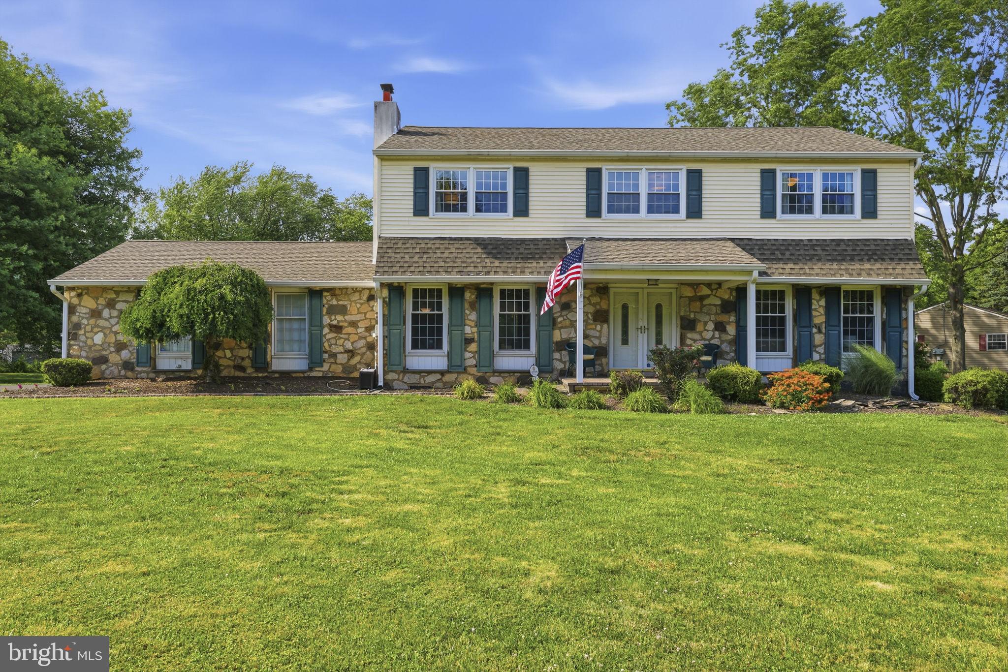 Set on a large 1.25-acre corner lot across from Turk Park and the ball fields, this beautifully updated home offers the perfect blend of space and convenience.  A long driveway welcomes you home, leading to the attached two-car garage and providing plenty of additional parking.   As you step inside the foyer, you'll find a classic and functional layout designed for both everyday living and entertaining. The bright and airy eat-in kitchen has been beautifully renovated with ​​granite countertops, stainless steel appliances, a glass tile backsplash, and ample cabinetry.  Just off the kitchen, the mudroom/laundry room provides convenient access to the ​garage.  The family room features a cozy fireplace, custom built-in cabinetry, and plenty of space to gather.  A formal dining room and spacious living room complete the main level.  Upstairs, the primary suite offers a walk-in closet and an updated en suite bathroom. Three additional generously sized bedrooms and a beautifully updated hall bath provide an abundance of space.  The finished basement adds valuable living space, perfect for a recreation room, home office, gym, or media area, while still offering a dedicated storage room and utility area.  Outdoor living is equally impressive with a large two-tier deck overlooking the beautifully landscaped, fenced backyard.  Beyond the fenced area, additional yard space provides even more room for recreation and gardening.  Combining timeless colonial charm, thoughtful updates, abundant living space, and a prime location near parks and recreation, this exceptional property offers the perfect place to call home.
