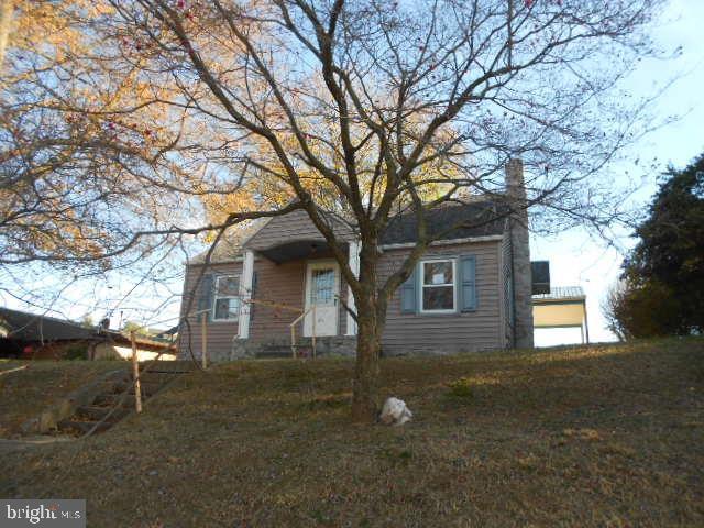 Cape Cod style home located in Eastern Schools, boasting 3 Bedrooms, 1 Full bath, C/A, lower level has bath rough in.  32x30 Pole building w/16 foot car port, rough in for bath, and is hooked to water and sewer.  These are only a few of the things offered with this home.