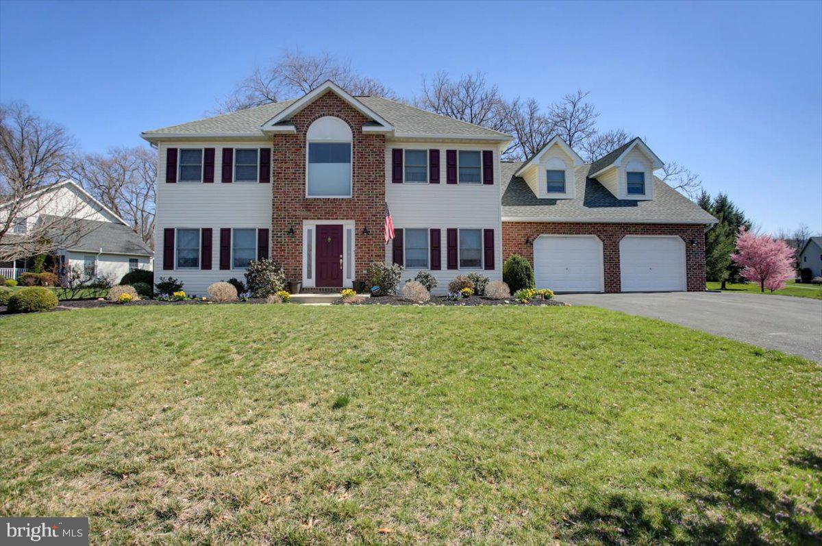 Welcome to this meticulously maintained home, offering nearly 2,800 square feet of pure comfort and charm. The stunning red oak hardwood floors & staircase are just the beginning of the exceptional details throughout. With an open floor plan, 4 spacious bedrooms, a den, 2 ½ baths, and an oversized, fully finished garage, this home has it all. The partially finished basement offers ample storage space, while the large covered patio is perfect for outdoor enjoyment. The lot is generously sized, featuring mature flowering trees, beautiful landscaping, a shed, and a peaceful wooded backdrop. As a bonus, lawn care is covered through 2025! Natural gas ensures affordable heating year-round. This home is truly move-in ready and promises to impress!