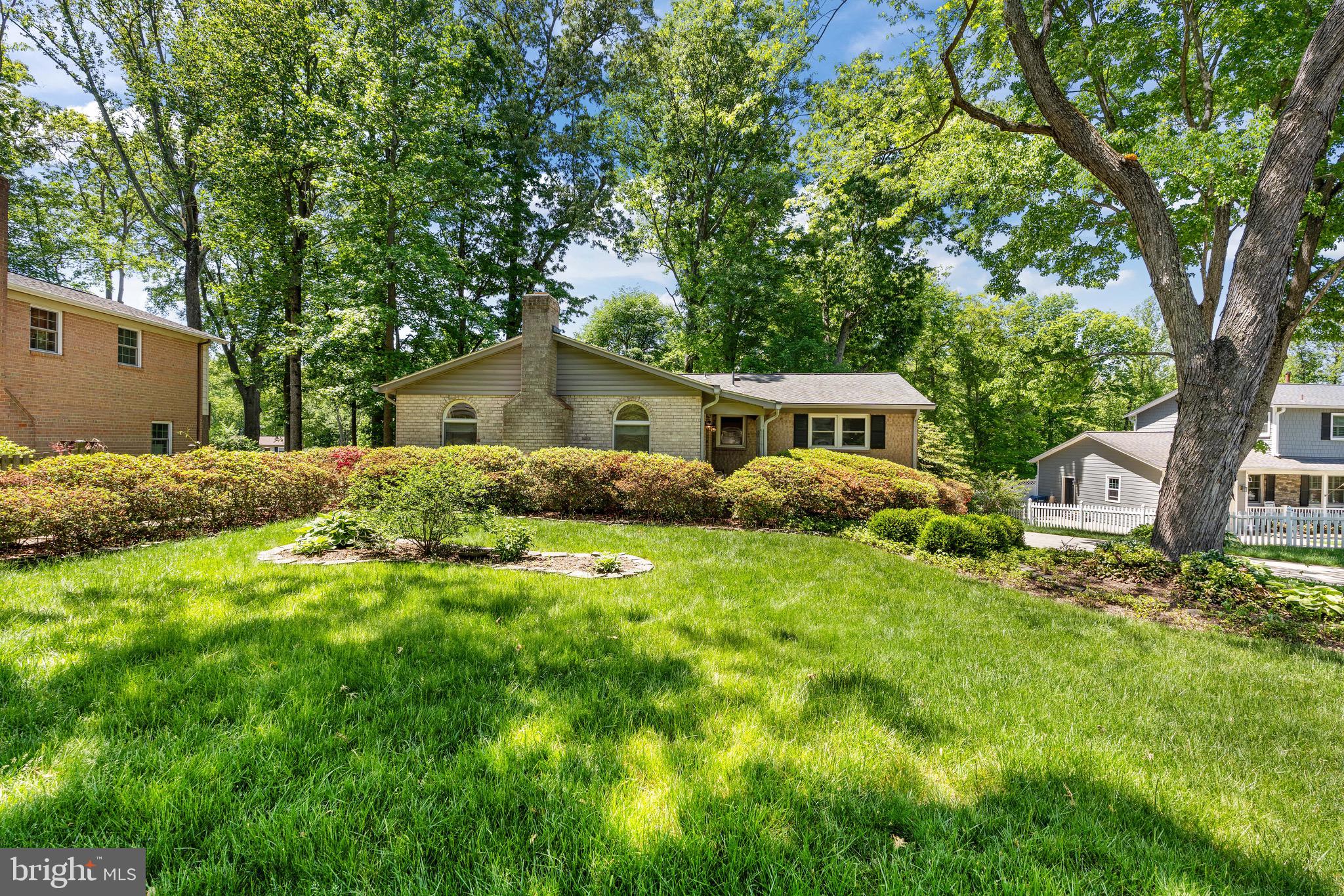 PRICE ADJUSTED  Come to OPEN HOUSE on Saturday 1-3 and see this welcoming, beautifully maintained and thoughtfully updated home!  Ideally situated on a quiet cul-de-sac, where a charming brick walkway and mature landscaping sets the tone for what’s inside. Step into a light-filled entry featuring skylights and classic brick flooring, anchored by a striking wood-burning fireplace, creating a warm and memorable first impression.
The open kitchen is designed for both everyday living and entertaining, showcasing Craftsman-style maple cabinetry, stainless steel appliances, granite countertops, and pocket doors leading to the dining room. A spacious gathering area with custom built-ins adds both function and charm.
The home offers 4 bedrooms (3 upstairs, 1 on the lower level) and 3 full bathrooms, including a fully renovated hall bath (2023). Hardwood floors run throughout the main-level family room, dining room, and bedrooms.
The finished lower level provides exceptional flexibility, featuring a full bedroom and full bathroom, a large sitting area with a second wood-burning fireplace, and a dedicated office space—perfect for guests, multi-generational living, or working from home. The space is complete with brand new carpeting, fresh paint and crown molding for a polished feel.
Step outside to a private backyard retreat, complete with a patio—perfect for relaxing or entertaining—surrounded by mature landscaping for added privacy.
Major updates include a water heater (2023), HVAC (2015), carpet (2026), new paint and roof (approx. 10 years old). Additional highlights include updated windows and timeless finishes throughout, offering a perfect blend of comfort, character, and functionality.