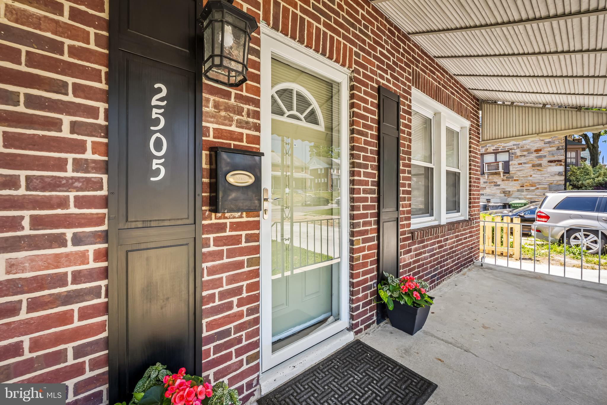 Call agents for appointment. See contact info below. Beautifully renovated 4/5-bedroom brick home offering the perfect blend of classic charm and modern updates! This move-in ready property features brand new flooring throughout, a stunning new kitchen, and fully renovated bathrooms.  There is a potential 5th bedroom or den/office off of the living room. The spacious lower level includes a kitchenette, bedroom, and full bath, creating an ideal setup for a potential in-law suite or extended living space. Enjoy outdoor living from the inviting covered wrap-around front porch overlooking the lovely yard. Additional highlights include a private driveway, detached garage, and location in a quiet, established neighborhood just steps away from Cylburn Arboretum.  Conveniently situated near shops and dining including Whole Foods Market, Starbucks and The Village of  Cross Keys.