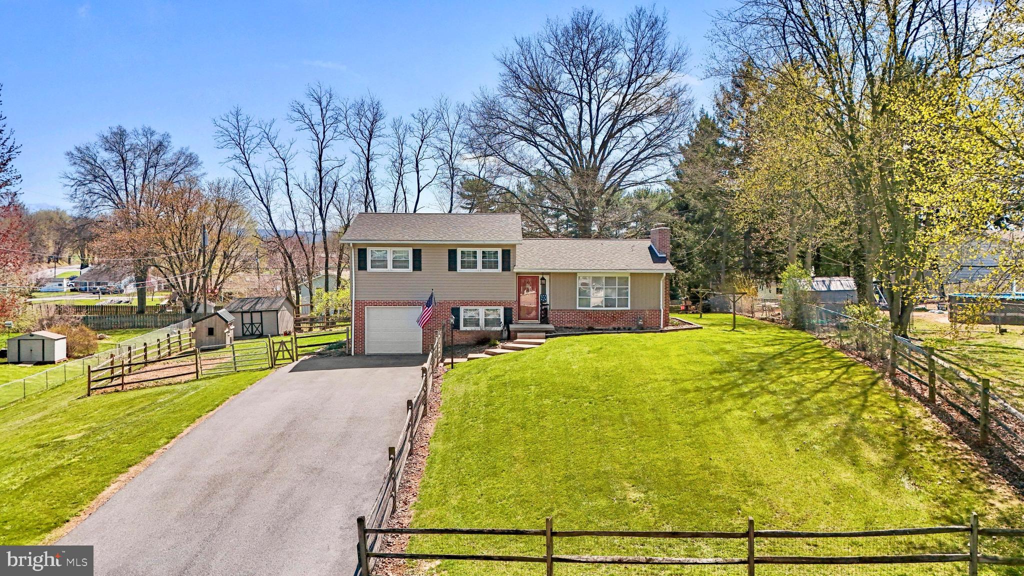 Stop scrolling, you just found THE ONE!  It’s sure to be love at first sight from the minute you pull in the driveway.  The entryway welcomes you into the spacious living room with your cozy fireplace and leads you right to the open dining space.  The kitchen has been beautifully updated and has brand new SS appliances.  And a bonus…a gas stove!  Go up a few steps to find a large, nicely redone, full bath with 3 spacious bedrooms.  In your main bedroom you have your own private half bath.  With 2 more living spaces on the lower levels you’ll have room for all the things!! You can have your workout space, family room,  play room, or even a 4th bedroom!  The yard is fully fenced and beautifully landscaped allowing you to roam freely.  This low maintenance house is ready and waiting for you.  The only work you’ll need to do is unpack!