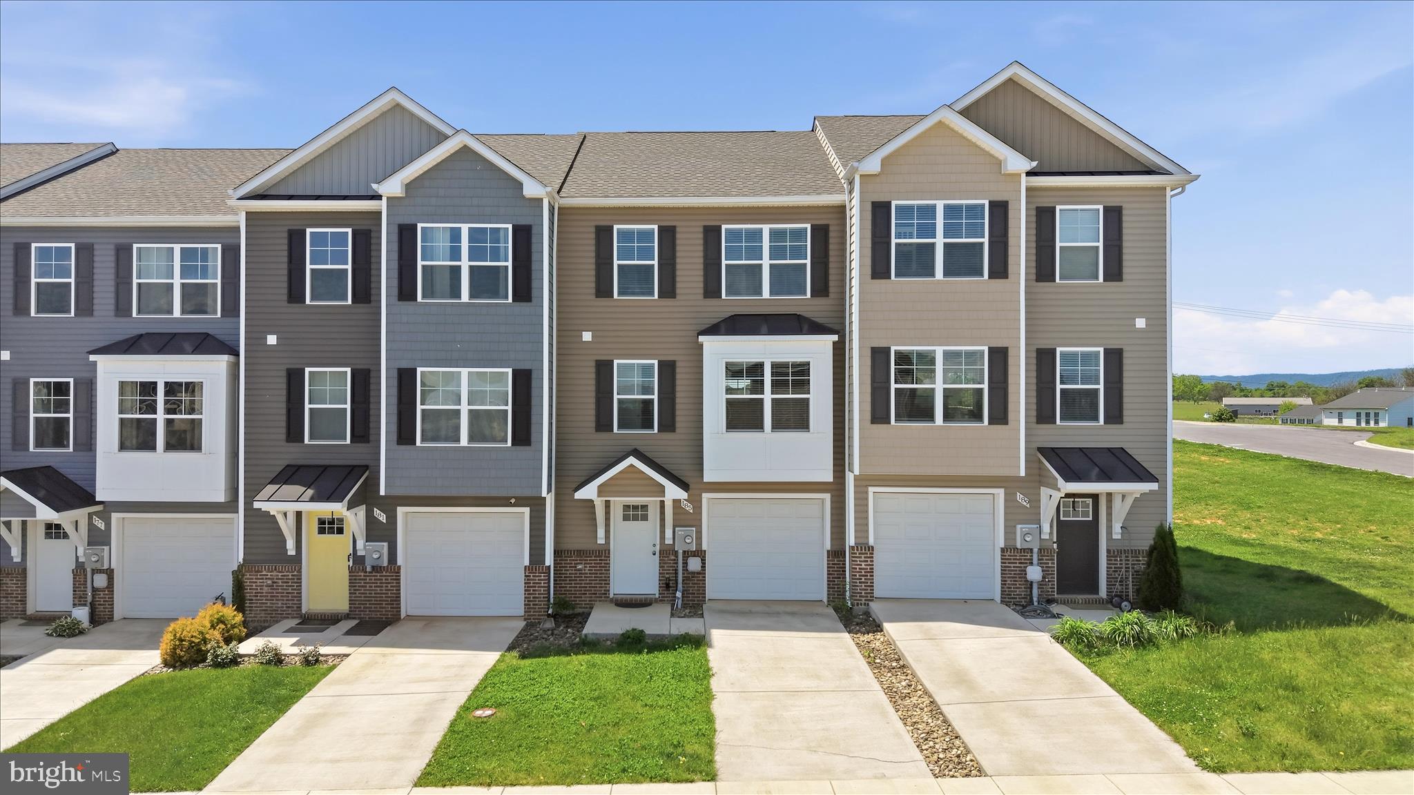 Welcome home to this move-in-ready townhouse in the highly desirable Communities of Burwell! Built in 2022, this spacious 4-bedroom, 3.5-bath home offers a versatile layout with two primary suites, including a ground-level suite with an ensuite bath and direct backyard access, perfect for guests or multi-generational living.
The main level features an open-concept design with a gourmet kitchen boasting a large island, soft-close cabinets, stainless steel appliances, and a spacious living room with a bump-out extension. Upstairs, the primary suite showcases cathedral ceilings, a walk-in closet, a double vanity, and a walk-in tile shower. Two additional bedrooms, including one with an added bump-out, share a full hall bath.
Enjoy outdoor living on the oversized rear deck with newly added stairs leading to the backyard. Additional highlights include an oversized one-car garage with an app-enabled garage door opener. Conveniently located just minutes from Interstate 81, shopping, dining, and local amenities, this home offers comfort, style, and convenience all in one. Schedule your showing today!