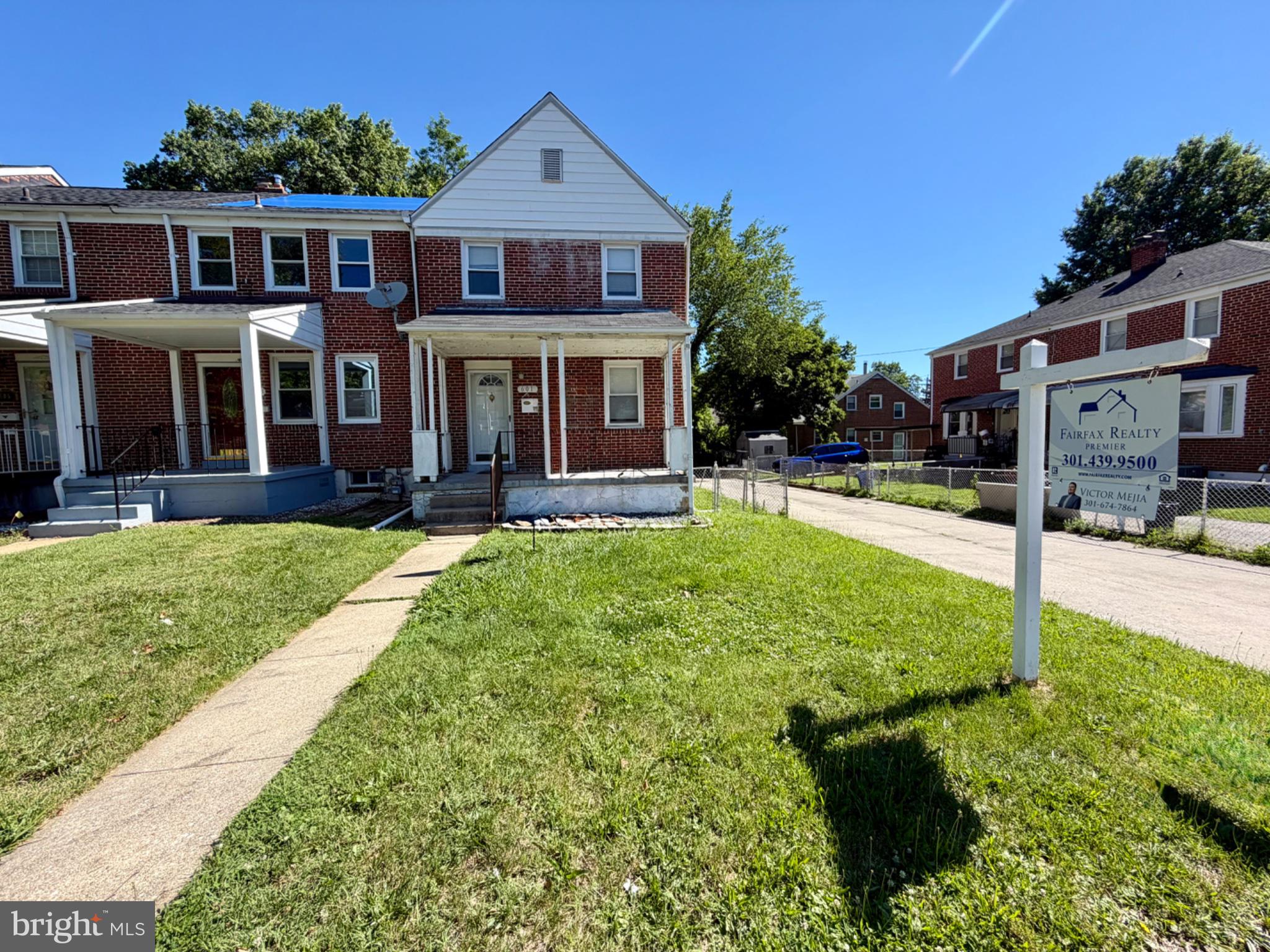 Welcome to your next home. This comfortable, move-in ready opportunity is conveniently locatedclose to Route 40,  shopping, dining, and everyday essentials. This fee simple corner townhome, meaning no ground rent — a major bonus for buyers looking for added value and ownership flexibility!

As you enter, the main level waits for you with a spacious living room filled with natural light, a separate dining area, and a kitchen with an eat-at bar and pantry. The second floor offers a generously sized primary bedroom, two additional well-sized bedrooms, and a full bath. The finished lower level provides a generously sized additional living space perfect for a family room, rec area, or home office, along with a large utility/storage room, half bath, and walk-out access.

Major mechanical updates have already been taken care of, including a newer HVAC system, sump pump (2023), water heater (2025), and city-completed attic insulation/winterization improvements, giving the next owner peace of mind. Rear parking pad fits 2 vehicles and is already fitted with an EV-charger for convenient off-street parking. 

This is a solid home with great bones, natural light throughout, and room for your own cosmetic touches. Ready for its next owners to move in and make it their own. Don't miss out on this great opportunity!