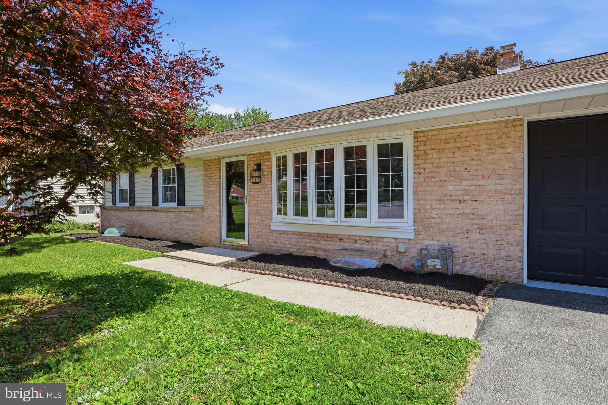 Welcome home to this beautifully renovated 4-bedroom, 2 full bath gem!

Nestled in one of the most sought after locations of York Township and desired district of Dallastown Schools,  This nearly 1700 sqft property has been thoughtfully updated, offering the perfect blend of old character, modern finishes and functional living. Step inside to discover brand-new flooring and carpet throughout, bathed in natural light complemented by new recessed lighting in the living room that includes updated fixtures in every room.

The heart of the home shines with a fully renovated kitchen featuring sleek quartz countertops, new stainless steel appliances, and stylish finishes that make cooking and entertaining a pleasure. The updated main bathroom adds a fresh, modern touch, while the fully finished basement expands your living space that includes a private bedroom with ample closet space, a brand-new full bathroom with modern design, dedicated laundry room, separate utility room, and ample storage — perfect for guests, a home office, or additional family space.

Major systems have all been addressed for peace of mind: new hot water heater and updated 200-amp electrical service ensure this home is move-in ready for years to come.

Outside, enjoy an attached garage complete with added cabinetry for extra organization, plus a storage garage in the backyard — ideal for tools, hobby space, or overflow storage. All of this sits on a beautiful, nearly half acre lot with expansive backyard space perfect for gardening and this summers activities. A prime location lending quick and easy access to Route 83, making commutes and errands a breeze.

This one checks all the boxes and is sure to move fast! Don’t miss it, book your showing today!