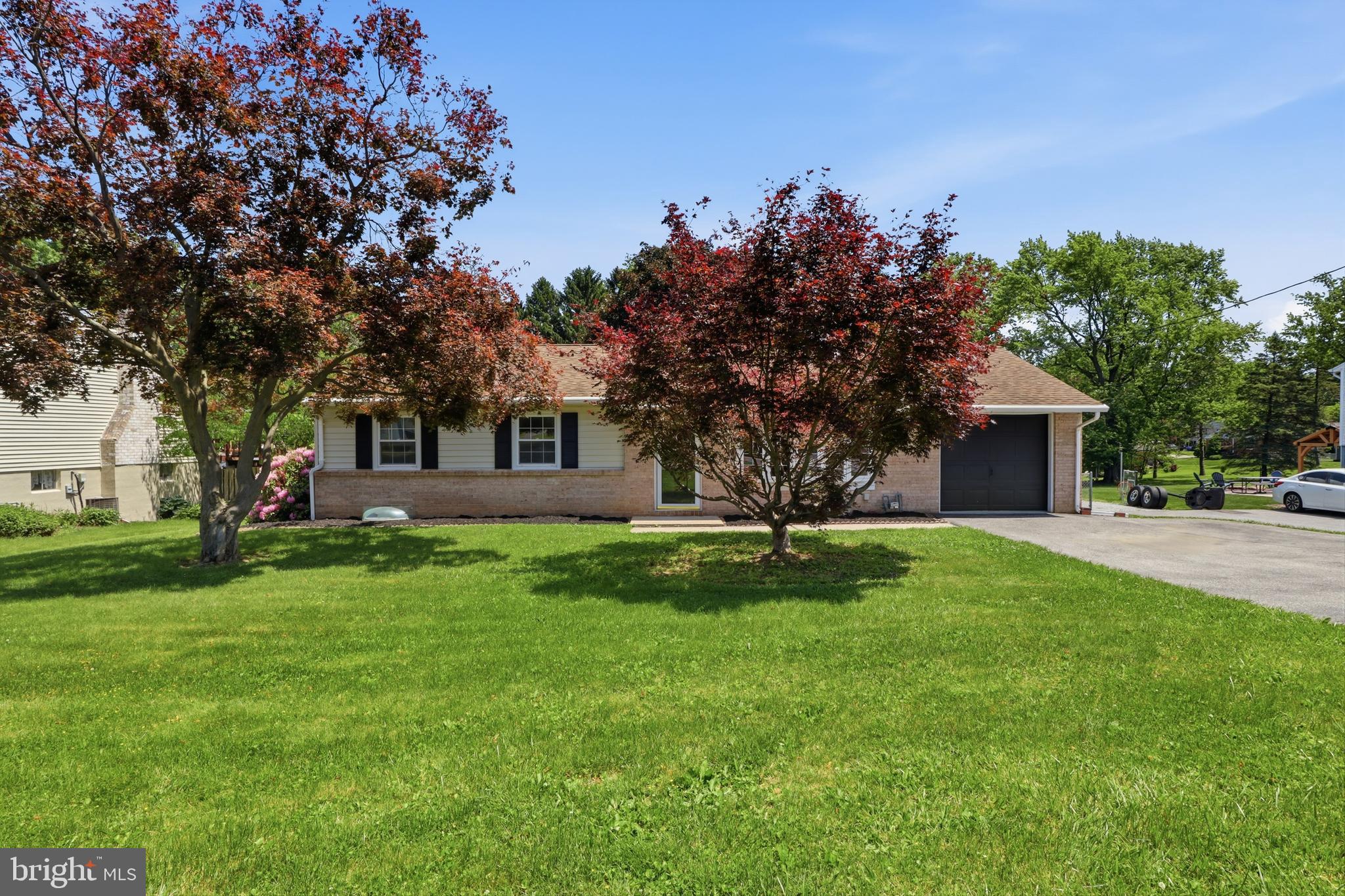 Welcome home to this beautifully renovated 4-bedroom, 2 full bath gem!

Nestled in one of the most sought after locations of York Township and desired district of Dallastown Schools,  This nearly 1700 sqft property has been thoughtfully updated, offering the perfect blend of old character, modern finishes and functional living. Step inside to discover brand-new flooring and carpet throughout, bathed in natural light complemented by new recessed lighting in the living room that includes updated fixtures in every room.

The heart of the home shines with a fully renovated kitchen featuring sleek quartz countertops, new stainless steel appliances, and stylish finishes that make cooking and entertaining a pleasure. The updated main bathroom adds a fresh, modern touch, while the fully finished basement expands your living space that includes a private bedroom with ample closet space, a brand-new full bathroom with modern design, dedicated laundry room, separate utility room, and ample storage — perfect for guests, a home office, or additional family space.

Major systems have all been addressed for peace of mind: new hot water heater and updated 200-amp electrical service ensure this home is move-in ready for years to come.

Outside, enjoy an attached garage complete with added cabinetry for extra organization, plus a storage garage in the backyard — ideal for tools, hobby space, or overflow storage. All of this sits on a beautiful, nearly half acre lot with expansive backyard space perfect for gardening and this summers activities. A prime location lending quick and easy access to Route 83, making commutes and errands a breeze.

This one checks all the boxes and is sure to move fast! Don’t miss it, book your showing today!