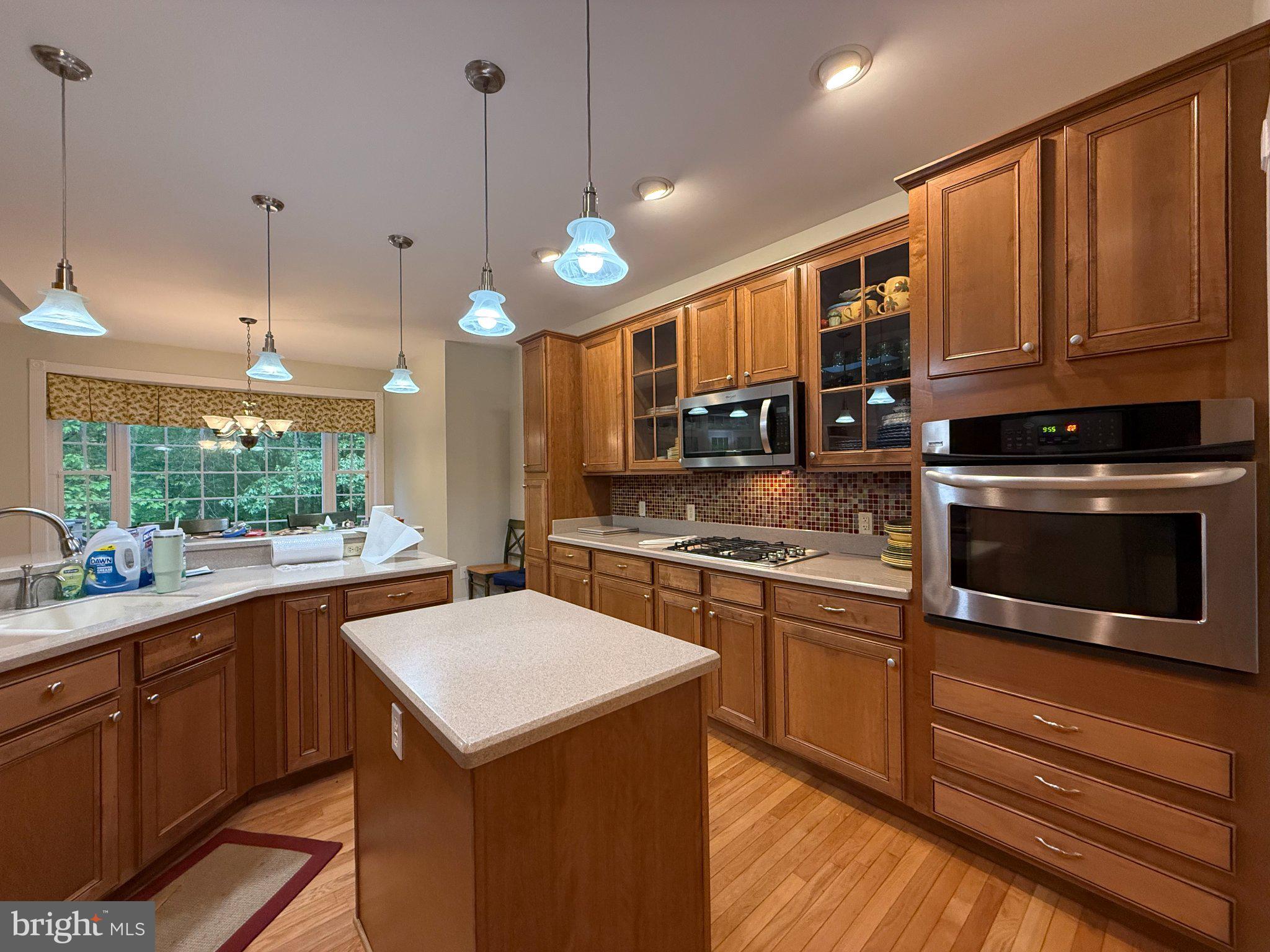 Welcome to this beautifully situated three-bedroom, two-and-a-half-bath home offering 2,316 square feet of finished living space, plus an additional 2,316-square-foot unfinished basement—ready for your personal vision.

Tucked away in the back corner of the peaceful Peach Tree Hollow community, this home backs to protected forest conservation, providing privacy and beautiful natural surroundings. Inside, you’ll find a cozy gas fireplace and a gas cooktop, while outside, the spacious Trex deck is perfect for relaxing or entertaining. A remote-controlled electric awning extends over the deck to provide shade and comfort.

Additional features include a two-car garage with automatic door openers and an underground sprinkler system. With generous living space, a full unfinished basement, and a quiet, private setting, this exceptional property is a wonderful place to call your forever home.