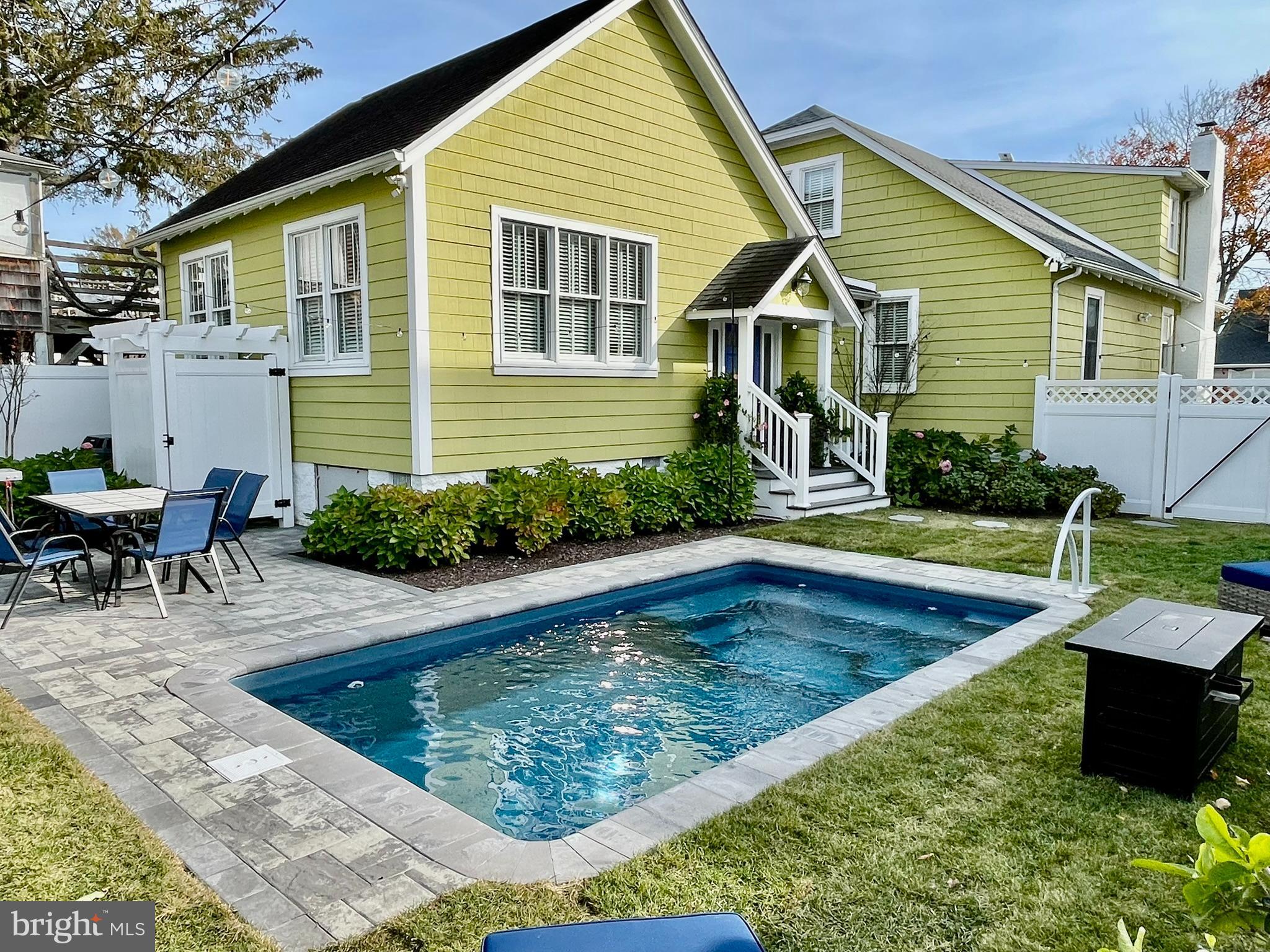 Back on the Market after a Kitchen Upgrade, a beautiful classic home where traditional meets coastal, offering a spectacular location on the second block of the renown Baltimore Avenue, close to the beach, boardwalk, restaurants, shopping, and everything Rehoboth Beach has to offer. This updated 4-bedroom, 4 1/2-bathroom home offers plenty of room for entertaining, with a great room that flows directly into the dining room, a living room, a family room, a sunroom, a bedroom with full bath nearby on the first floor, 3-bedrooms with baths ensuite on the second-floor, full-size front-loading washer and dryer, a fenced yard with a beautiful heated salt water swimming pool, an outdoor shower, a patio with outdoor dining, and off street parking. Updates include a new HVAC system on the first-floor, LG HVAC units in all second-floor bedrooms, laminate flooring on the second-floor, composite decking installed on all entry doors, lawn irrigation system, landscaping with 36-hydrangeas, 4-Crape Myrtles, and 3-evergreen trees, Hunter Douglas blinds throughout the house, several rooms freshly painted, new beadboard paneling, wallpaper, faucet, and shower head  replaced on the first floor full bath, and new light fixtures, shower heads and toilets in all second-floor bathrooms. This property is being sold furnished and turnkey. It is a great investment opportunity that offers an exceptional rental history with $164,000 in 2025 and 101 reviews with a 4.8 Star rating online!  Don’t wait, call to schedule an appointment today!