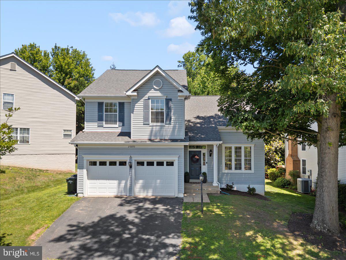 Welcome to this beautifully maintained home in the sought-after Lowes Island community, where timeless design, thoughtful updates, and an exceptional location come together. From the moment you enter, you’ll appreciate the bright and airy atmosphere, enhanced by hardwood flooring throughout the main level and an inviting layout designed for both everyday living and entertaining.

The main level features elegant formal living and dining rooms, offering flexible spaces for gatherings, celebrations, or quiet evenings at home. At the heart of the home, the upgraded kitchen is appointed with granite countertops, stainless steel appliances, abundant cabinetry, and a seamless connection to the breakfast area and spacious family room, creating an ideal flow for modern living. Large windows bring in natural light throughout the space, while easy access to the expansive rear deck provides the perfect setting for outdoor dining, relaxing, or entertaining in a private backyard setting.

Upstairs, the spacious primary suite offers a comfortable retreat complete with a large walk-in closet and an upgraded en-suite bath featuring dual vanities, a soaking tub, and a separate oversized shower. Three additional bedrooms and an updated full hall bath provide ample space for a variety of living needs.

The fully finished lower level expands the home’s versatility with an enormous recreation room ideal for movie nights, game days, fitness space, or entertaining. A separate den offers excellent flexibility for a home office, hobby room, or guest space, while the additional full bath adds convenience for visitors or extended stays.

Significant updates include a roof replacement in 2019, providing added peace of mind for years to come.

Located within the vibrant Cascades community, residents enjoy access to an impressive collection of amenities, including multiple community centers, swimming pools, tennis and multipurpose courts, playgrounds, and scenic outdoor spaces. Nearby Algonkian Regional Park offers additional recreational opportunities with river access, golf, trails, picnic areas, mini golf, and more. Conveniently located near shopping, dining, commuter routes, and everyday conveniences, this home offers the perfect blend of comfort, recreation, and accessibility in one of Northern Virginia’s most established communities.