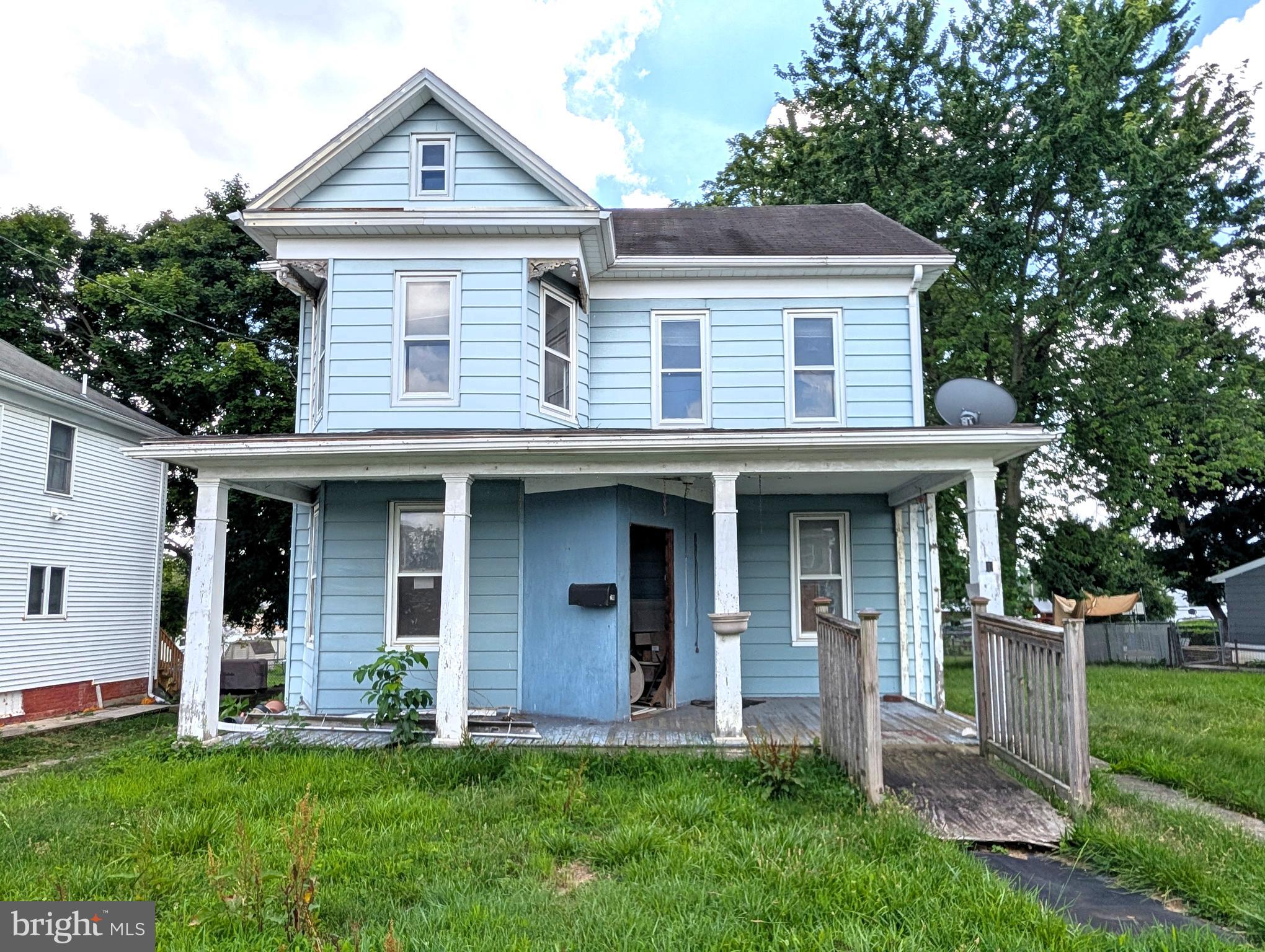 Opportunity awaits! This home needs renovated offering potential for a flip or hold investment. Features include a classic front porch, spacious living room, 1st floor laundry, & flexible layout for additional bedrooms. The basement and walk-up attic provide plenty of storage. Alley access leads to off-street parking & a garage. Make this property your own. Offered As-Is. ARV estimated @ $280k.