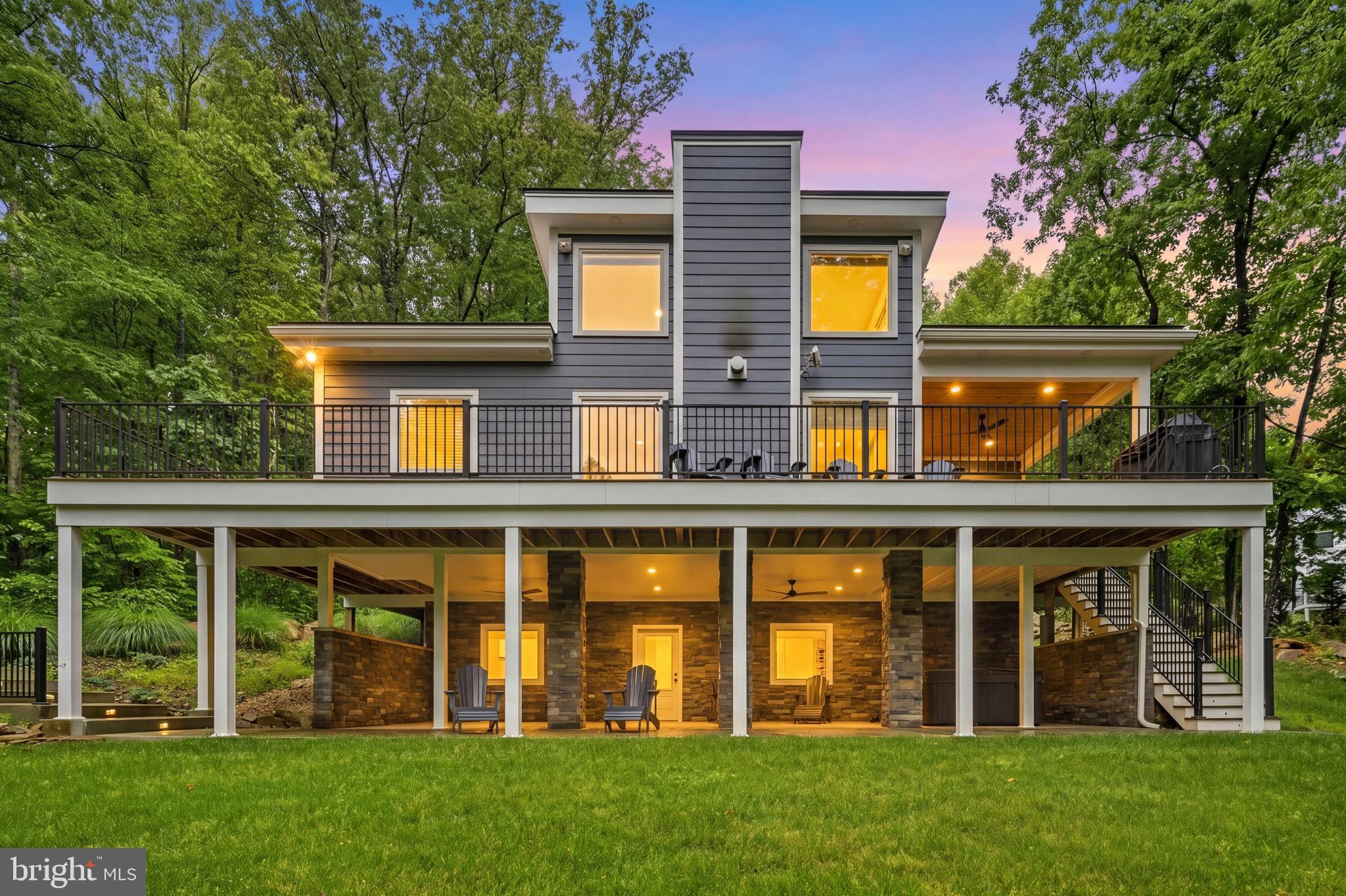 Offered for the first time, this exceptional mountain retreat is where comfort, character, and fun come together. Tucked against the scenic backdrop of Western Loudoun, this thoughtfully designed home has been lovingly maintained and previously enjoyed as a highly sought-after getaway—now ready for its next chapter.

Inside, you’ll find spacious, light-filled living areas designed for gathering and relaxing alike. The home features four private bedrooms and four and a half baths, offering plenty of room for hosting family and friends. An entertainer’s dream, the home is complete with a dedicated game and recreation space, perfect for unforgettable game nights and cozy evenings in. You'll love spending time in the kitchen, day or night, thanks so the ambiance provided by the under mounted lights on the island.

Step outside to unwind in the hot tub, surrounded by peaceful mountain views—an ideal spot to relax after a day spent exploring nearby wineries, breweries, hiking trails, and charming small towns. Multiple living areas and well-appointed finishes make this home equally suited as a full-time residence, weekend escape, or income-producing property.

With its proven appeal, inviting layout, and serene setting, this is a rare opportunity to own a truly special property that offers both lifestyle and versatility. Whether you’re seeking a personal retreat or a home that’s ready to welcome guests, this one is not to be missed.