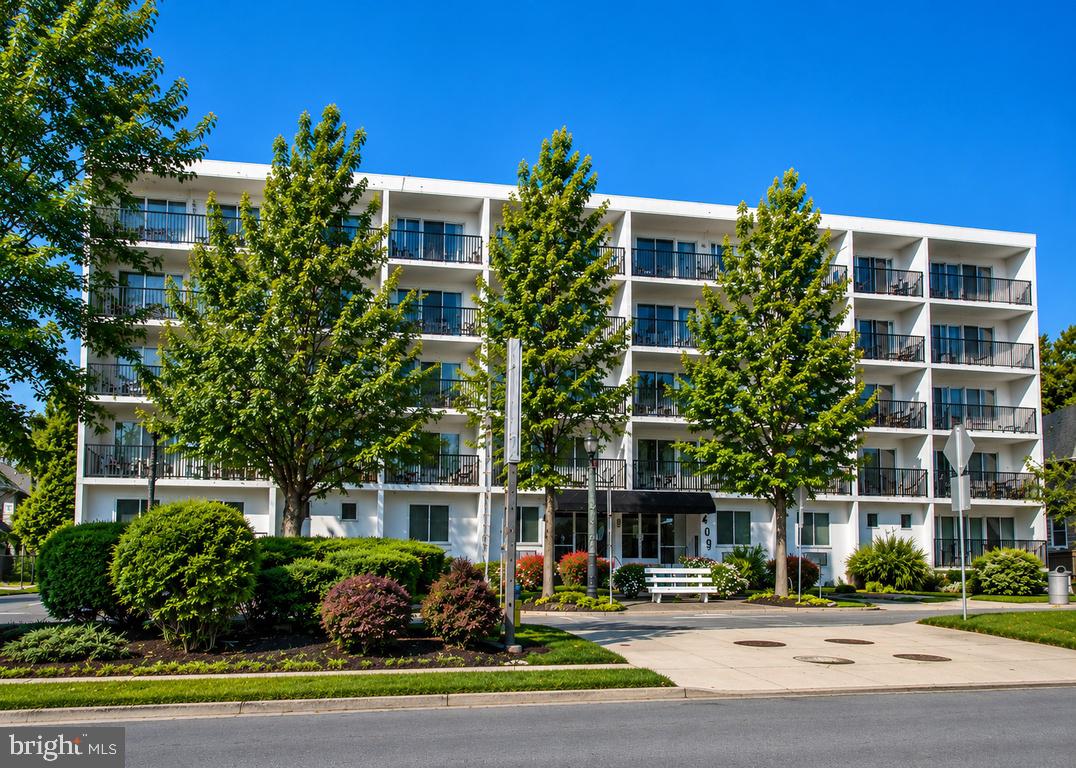 Easy to own. Easy to love. Easy to relax. Easy to rent.
A truly turnkey coastal getaway with excellent rental potential in one of Delaware’s most desirable beach towns.
Welcome to an exceptional opportunity within the City of Rehoboth Beach—affectionately known as The Nation’s Summer Capital. Situated directly on Rehoboth Avenue and just five blocks to the iconic boardwalk and the pristine Atlantic Ocean, this refreshed condo offers the ultimate blend of convenience, lifestyle, and coastal charm.

Whether you're seeking a turnkey beach retreat or a smart investment property, this residence checks every box. The unit was just revitalized with new paint, new luxury vinyl plank flooring on the main level, and new carpet on the bedroom level downstairs. The building itself has also been updated in recent years, ensuring a clean, modern look and ease of ownership.

The upper level features an open-concept living and dining area with abundant natural light, a granite kitchen with stainless appliances, and sliding doors that lead to your private balcony overlooking the vibrancy of Rehoboth Avenue—perfect for morning coffee, afternoon reading, or sunset cocktails.

On the lower-level, the spacious bedroom and full bath create a comfortable and quiet retreat, offering separation between living and sleeping spaces ideal for full-time use or vacation stays.

Step outside and enjoy award-winning dining, boutique shopping, art galleries, nightlife, and year-round events, all just moments away. Park your car and forget it—everything you love about Rehoboth Beach is steps away.