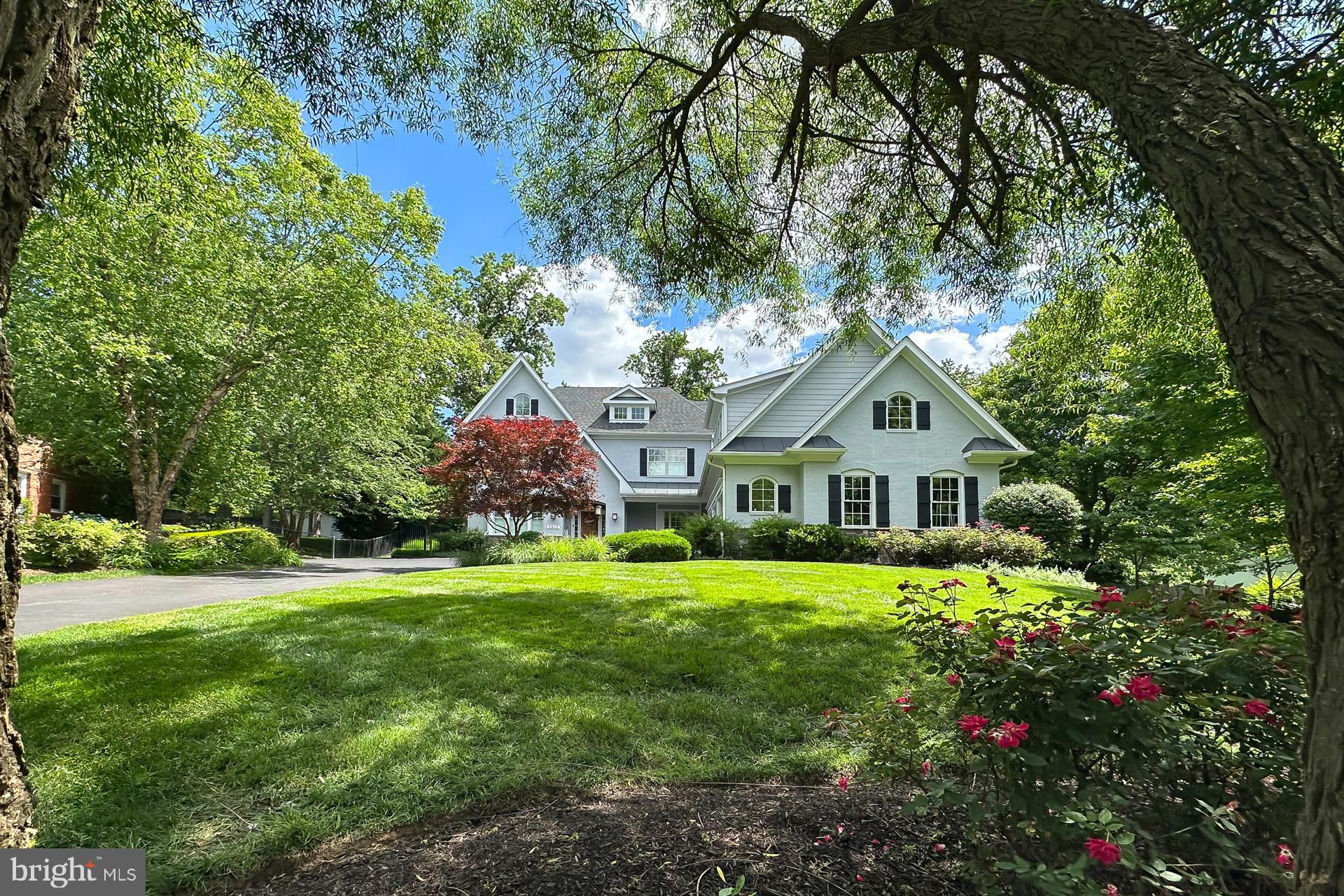 Welcome to 7912 Jansen Drive in Springfield, Virginia! Nestled in the Springfield Golf and Country Club community, this stunning 5 bedroom, 5 full and 3 half bath Craftsman-style is infused with fine millwork and designer upgrades. A tailored exterior with front porch entrance, 3-car garage, warm hardwood floors, contemporary lighting, custom moldings, plantation shutters, on trend designer paint, and spacious room sizes are only some of the reasons this home is so special. A multi-area composite deck, sparkling in-ground pool, built-in grilling station, and heated cabana offer an idyllic outdoor oasis, while a perfect blend of personal and family-oriented zones creates instant appeal. 
Fine craftsmanship begins in the welcoming foyer featuring rich hardwood flooring that flows into the formal living room where triple windows stream natural light. The formal dining room is accented by decorative moldings and a chic fusion chandelier adding a distinctly refined flair. The spectacular gourmet kitchen will please the sophisticated chef with striking granite countertops, traditional and glass-front cabinetry, designer backsplash, and commercial grade appliances including a gas range, suspended vented hood, and wall ovens; as a large, angled island with triple pendant lights and bar-style seating provides a visual boundary and the perfect spot for daily dining. The sun-filled breakfast area introduces the family room that is highlighted by a coffered ceiling, inset gas fireplace, and an exterior door opening to the deck, natural stone patio, an in-ground pool with mechanical cover, grilling station, and a covered cabana with fireplace and media niche—seamlessly blending indoor and outdoor dining, entertaining, and simple relaxation! Back inside, a library makes for a perfect home office or learning center, a mudroom with built-in cubbies adds convenience, a laundry center harbors a frameless shower that can be used for pet washing, and a powder room updated to perfection and second staircase complement the main level. 
Upstairs, the primary suite is highlighted by a tray ceiling, room for a sitting area, two walk-in closet tailored with custom shelving, and a luxurious ensuite bath with dual rectangular-sink vanities, sleek fixtures, and a two-person ultra shower with multiple heads—the perfect retreat to start and end your day. Down the hall, three additional bright and cheerful bedroom suites each enjoy designer carpet, generous closet space, and a private updated bath; while a versatile, expansive den plus second laundry center and bath can be tailored to suit the needs of your lifestyle. The lower level recreation room delivers space for a multitude of activities and with a pub-style wet bar, wine/dining niche, and theatre-style media area entertaining is effortless. A fifth bedroom, full bath, and ample storage solutions complete the comfort and luxury of this spectacular home. 

All this can be found in a peaceful community that feels a world away from the hustle and bustle, yet is super convenient to I-395, I-495, the Fairfax County Parkway, and Old Keene Mill Road. Plenty of shopping, dining, and entertainment choices can be found in nearby Springfield Town Center and Old Keene Mill Shopping Center puts all the daily necessities right at your fingertips. Outdoor enthusiasts can take advantage of the nearby “mega-park” created by Orange Hunt Estates Park, Hidden Pond Nature Center, and Pohick Stream Valley Park—all coming together to deliver a vast area of undisturbed natural beauty. For an exceptional home built with high-end finishing touches and distinguished charm, you've found it. Welcome home!