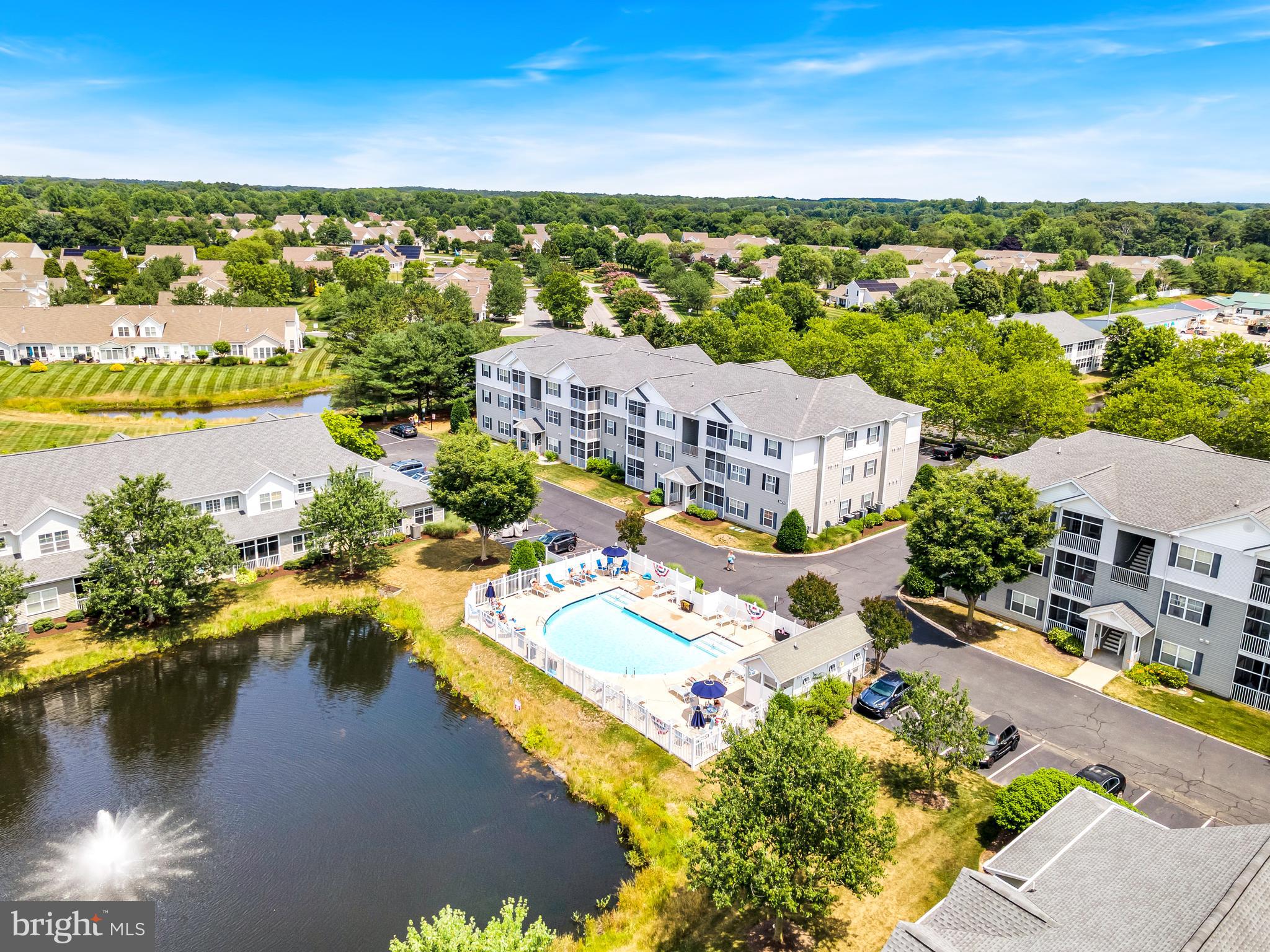 Coastal convenience meets carefree living in this beautifully maintained first-floor end-unit condo being sold completely turn-key.  All furnishings included.  Ideally situated between Lewes and Rehoboth Beach and  offering 2 bedrooms, 2 full baths, a screened porch, and a spacious, open layout, this home provides the perfect blend of comfort and location. Enjoy easy access to beaches, dining, shopping, bike trails, and everything Delaware’s resort area has to offer.  The thoughtfully designed floor plan features private bedroom suites, generous closet space, and inviting living areas that make everyday living and entertaining effortless. Whether you’re looking for a year-round residence, weekend getaway, or income-producing investment, this property offers exceptional flexibility and value. Community pool access and low-maintenance living complete the package, all just minutes from the sand, surf, and charm of downtown Lewes and Rehoboth Beach.