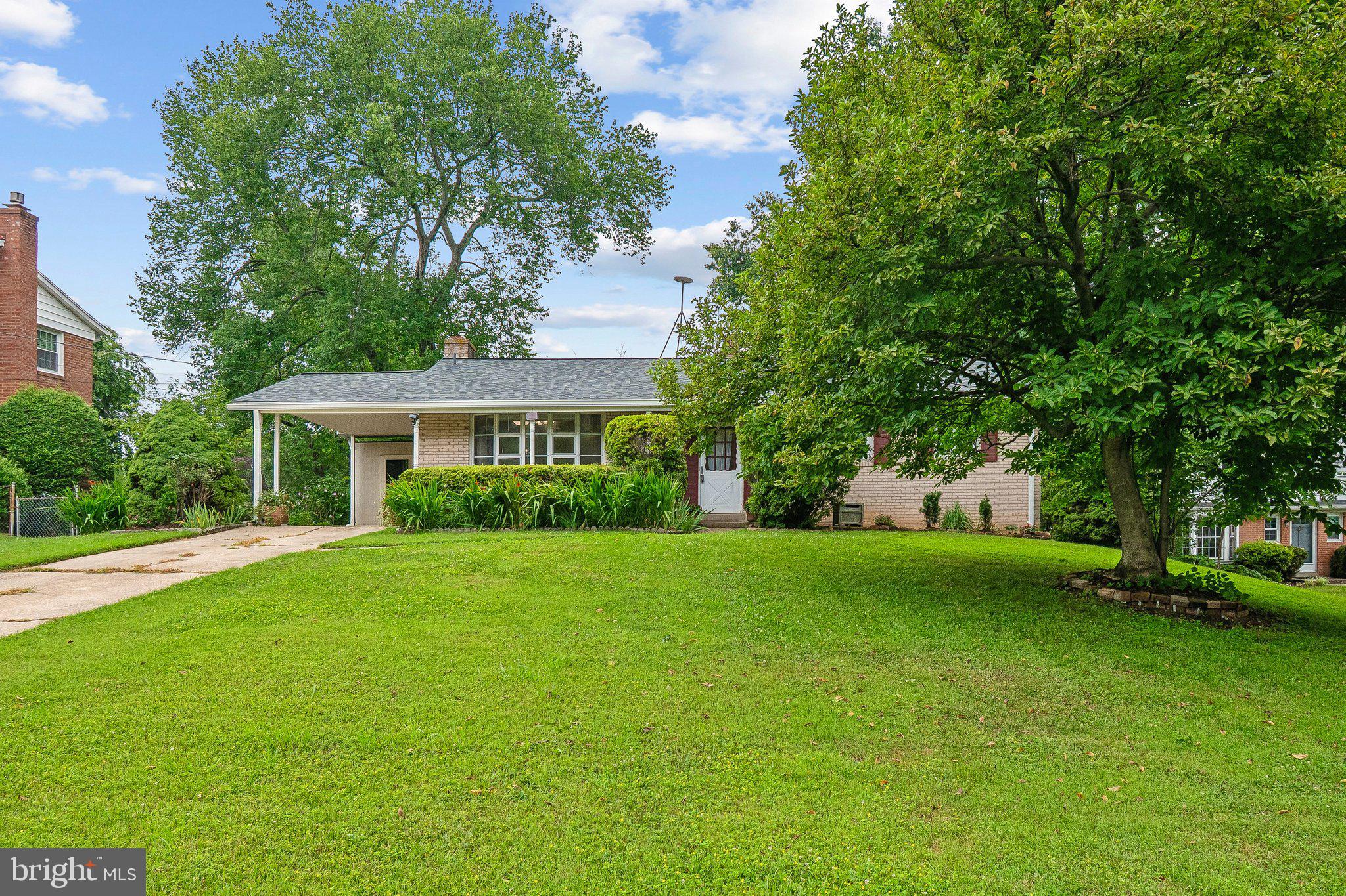 Rare opportunity in Foxhall community to own a beautiful 4 bed/3 bath home, that is freshly painted, in great condition and move-in ready!  The main level features abundant natural light, hardwood floors throughout the living and dining rooms, as well as the owners suite w/private bath.  There are 2 additional bedrooms and a central bathroom on the main level along with an eat-in kitchen.  In the newly carpeted lower level you will enjoy the spacious family room, perfect for entertaining, with sliding glass doors to the patio, and a large, level backyard.  There is also a fireplace and a legal bedroom and full bath, perfect for a nanny, mother-in-law or an office space.  Home is conveniently located near public transportation.