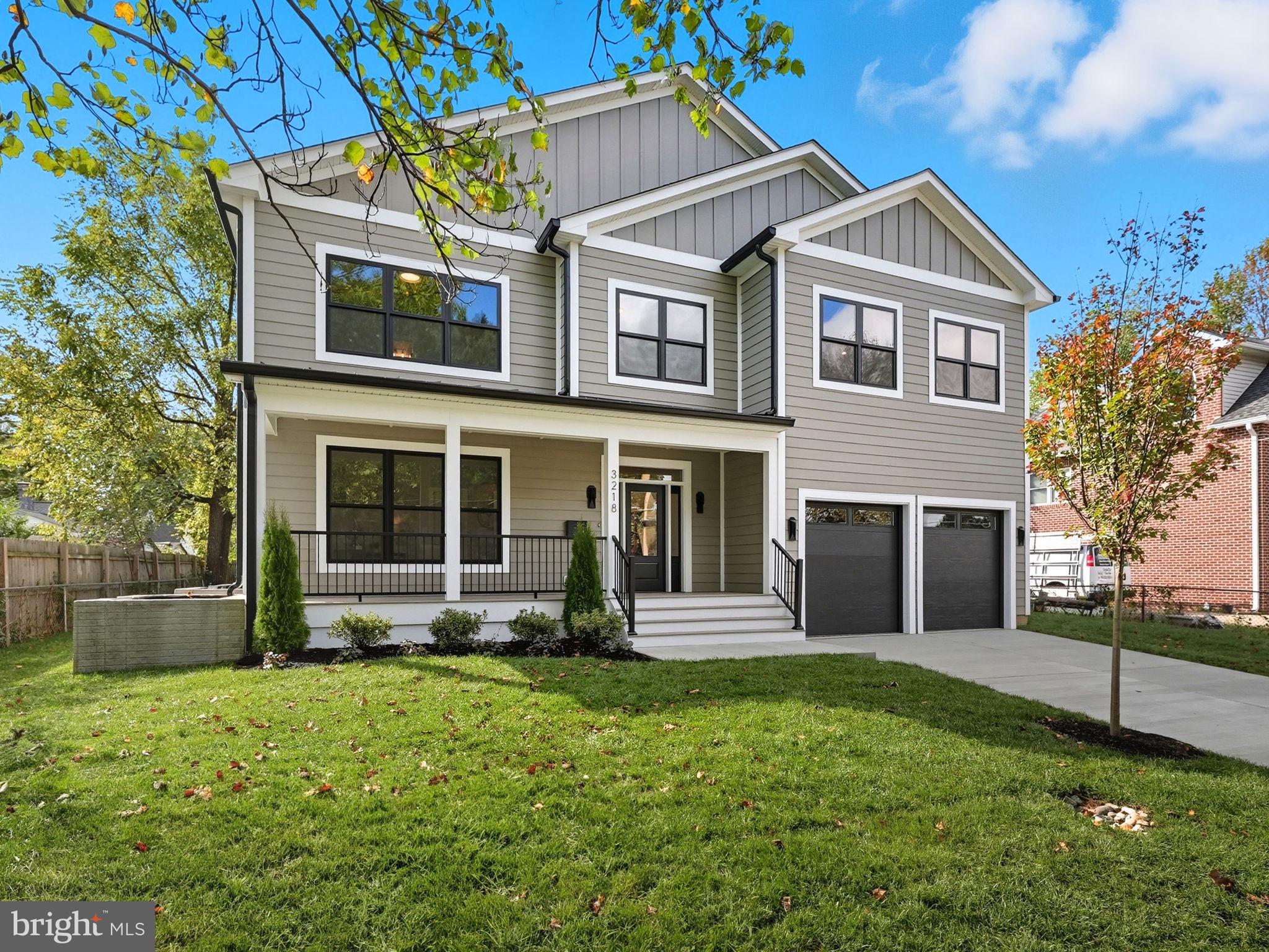 Welcome to 3218 Blundell Road — a brand new, thoughtfully designed 4,800 sq ft single-family home offering the perfect blend of luxury, comfort, and convenience. This spacious residence features 6 bedrooms and 5 bathrooms, ideal for modern living and effortless entertaining.

Step inside to a bright and airy open floor plan, highlighted by soaring 9-foot ceilings and abundant natural light. The main level boasts a stunning modern kitchen with an expansive mitered-edge island, high-end stainless steel appliances, a pot filler, walk-in pantry, and elegant designer cabinetry—perfect for both everyday meals and hosting gatherings. Across from the kitchen, the family room features a cozy gas fireplace and a wet bar with a beverage center, creating an inviting space for entertaining. A main-level bedroom with a private en suite bath offers ideal guest accommodations or a comfortable home office.

Upstairs, the luxurious primary suite provides a true retreat, complete with a spa-inspired bathroom featuring a spacious walk-in shower with dual shower heads, a soaking tub, and two generous walk-in closets. Three additional well-sized bedrooms and two additional full baths, including one with a double vanity, provide ample space for family and guests.

The walk-up lower level is designed for versatility, offering a large rec room, an additional bedroom with en suite bath, and a flex room perfect for a home gym, office, or craft space.

Enjoy outdoor living on the welcoming, expansive front porch with TimberTech decking, or in the spacious, flat backyard-ideal for play or entertaining. The recently paved driveway leads to a generous two-car garage with direct access to a mudroom featuring built-in cubbies and a bench for everyday convenience.

Located in a prime spot with unbeatable access to Washington, DC, this home is just minutes from Tysons Corner, Merrifield, and the Mosaic District. Enjoy close proximity to Seven Corners, Arlington, Alexandria, and Fairfax; making this an ideal location for commuters and anyone seeking the best of Northern Virginia living. Come check it out yourself!